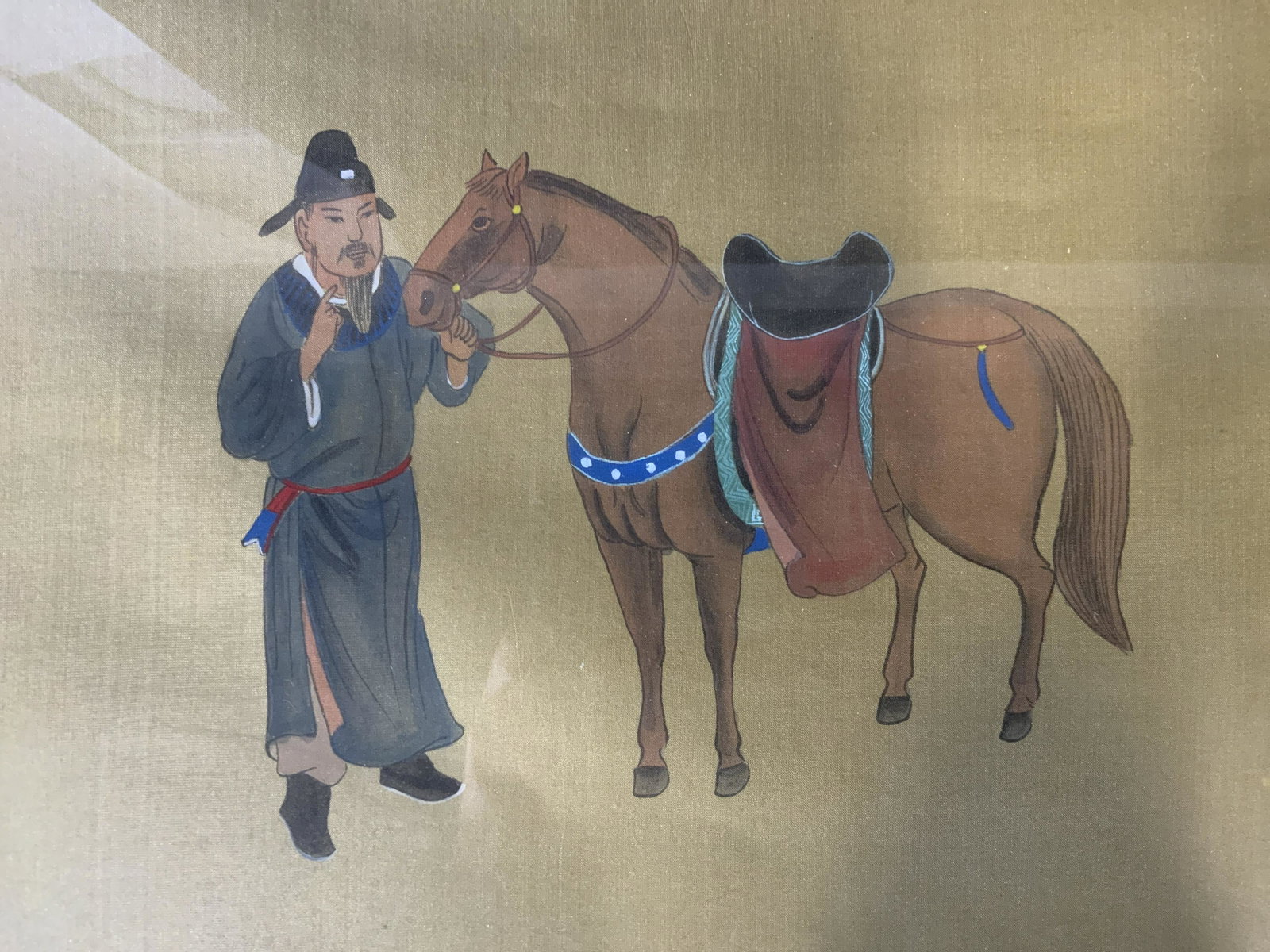 Chinese Painting on Silk Artwork: Chinese Painting on Silk, inscription to lower right in Chinese characters, subject a man with a horse, measures 18 x 21 7/8 inches, wooden frame, surface wear to frame, professionally framed and doub