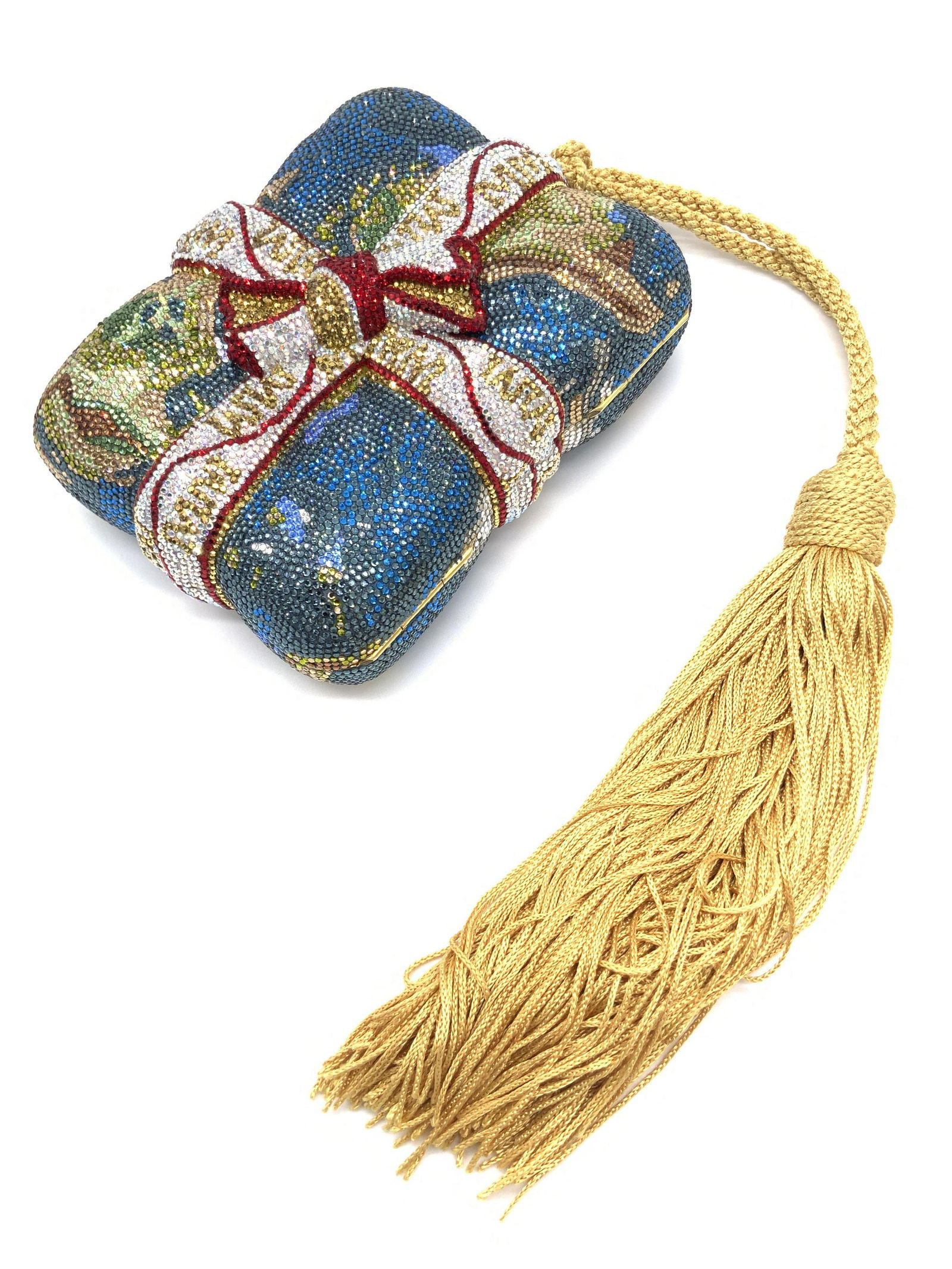 JUDITH LEIBER LE 39/200 Millennium 2000 Swarovski Purse: Collectible JUDITH LEIBER LIMITED EDITION (39/200) MILLENNIUM 2000 MINAUDIERE. The piece resembles a present. A raised bow design decorates the center. A gold toned tassel is affixed to the side. Mult