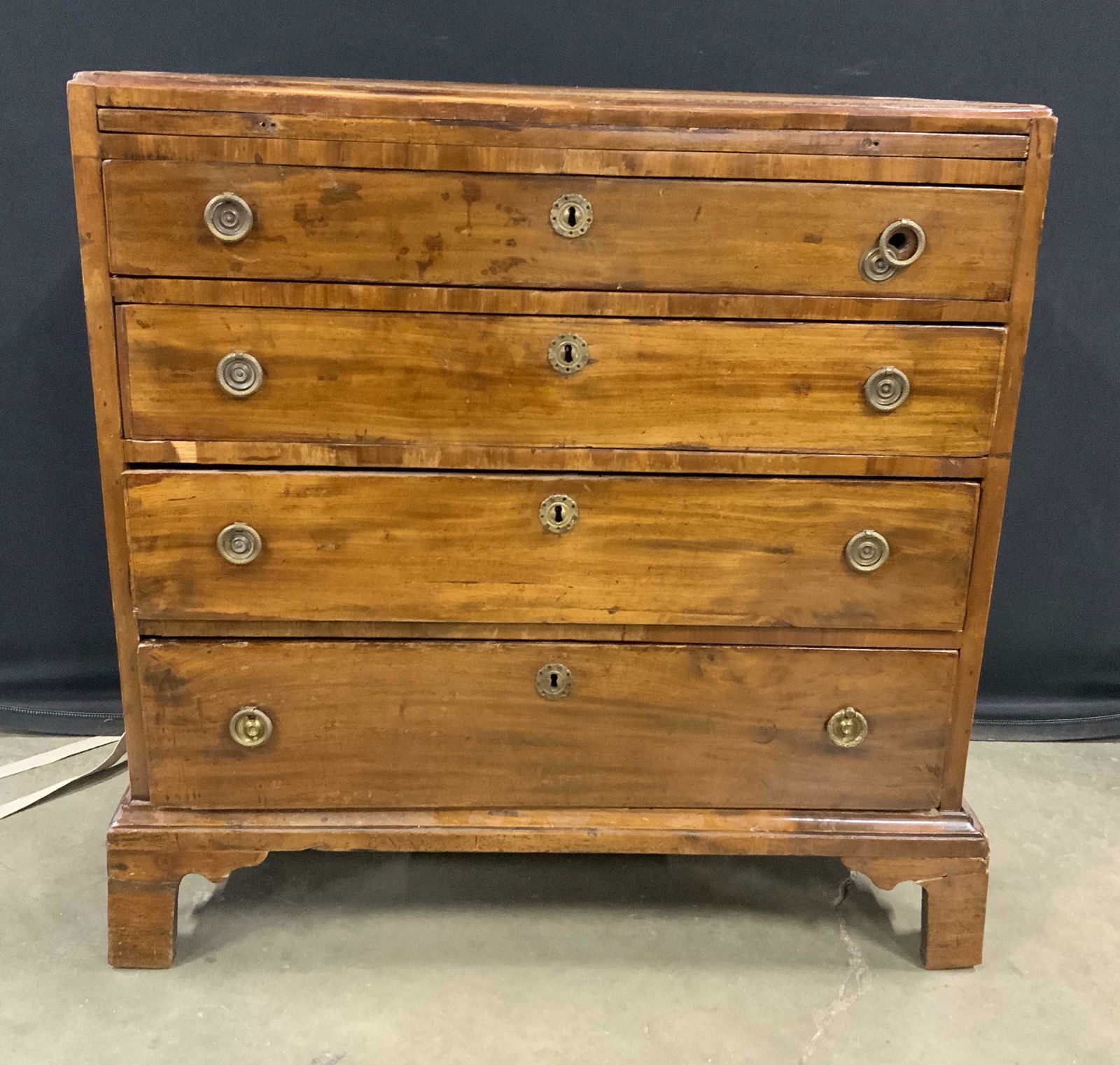 Antique Wooden English antique dresser/ Commode: English antique commode, inlaid banding, marquetry, parquetry and veneer, Elegant patina to wood, Antique wooden possibly pine. Drawer pulls are brass, joints are dovetailed. Brass locks present on ea