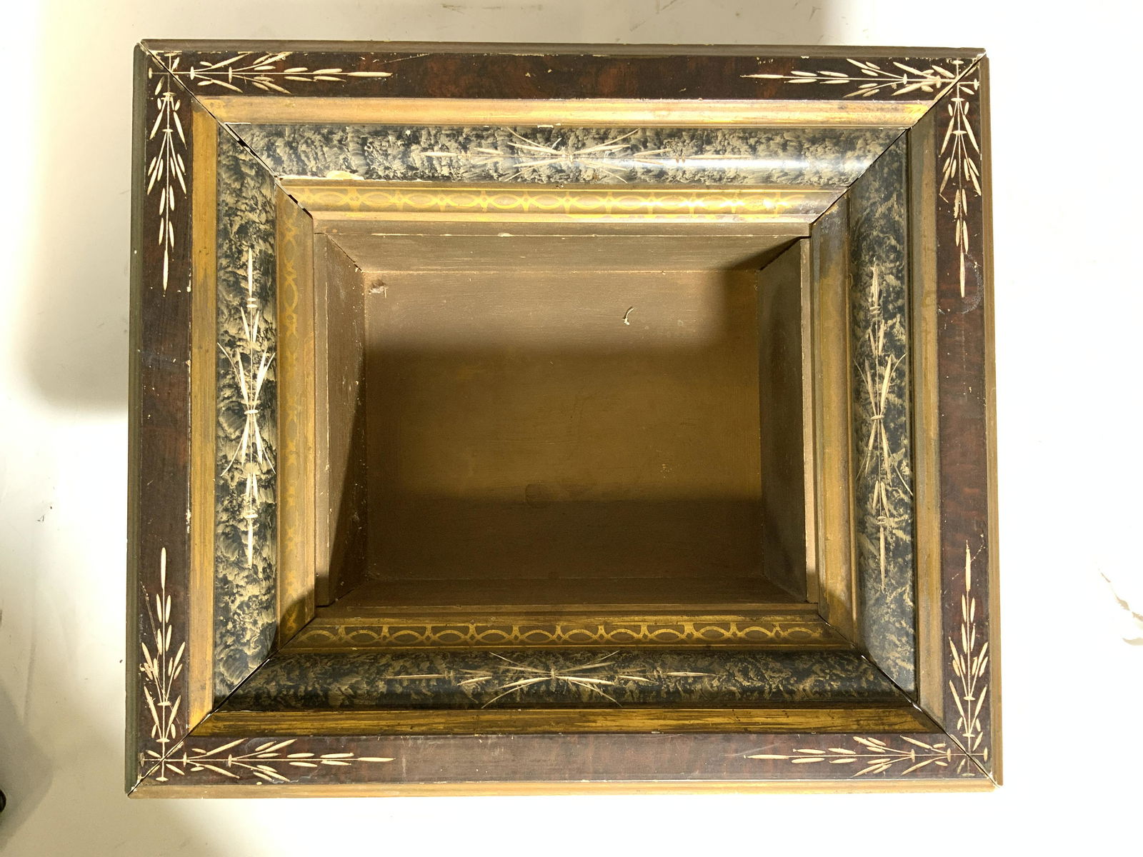Pair Vintage Victorian Shadow Box Frames: Lot includes 2 frames. Each are vintage possibly antique. Frames have Victorian style. . Frames have gold toned pattern detail on inner frame & relief detail on outer frame. Each measures approx 15 in