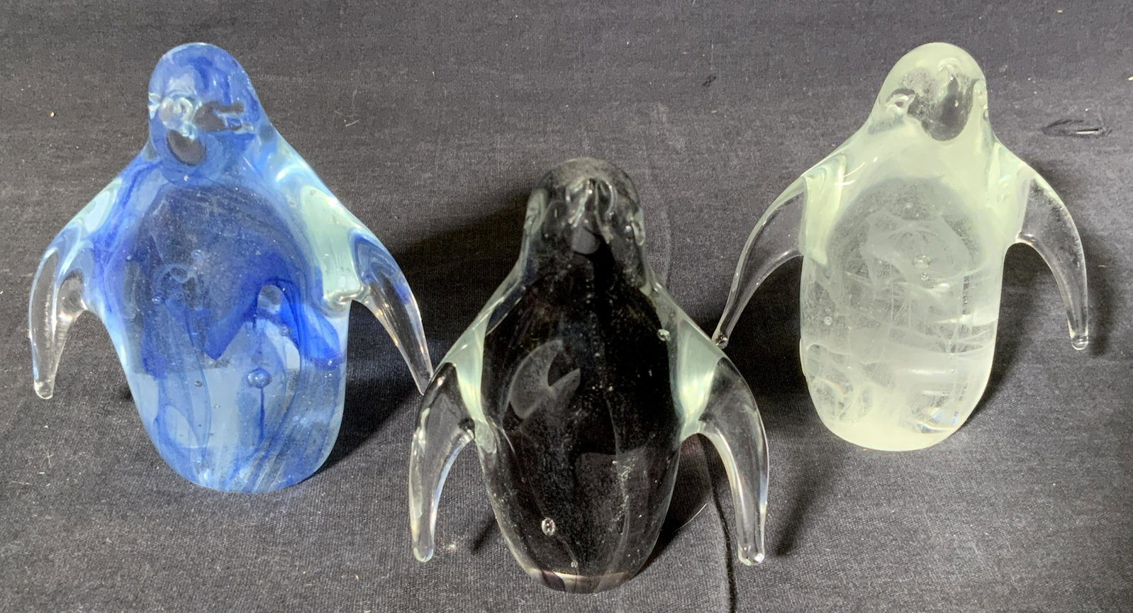 DYNASTY GALLERY 3 Art Glass Penguin Figurals: Dynasty Gallery 3 Art Glass Penguin Figurals, label to underside of each reads ‘Dynasty Gallery hand crafted in China’, each has a label to their backside that reads ‘Glow in the dark’, one of
