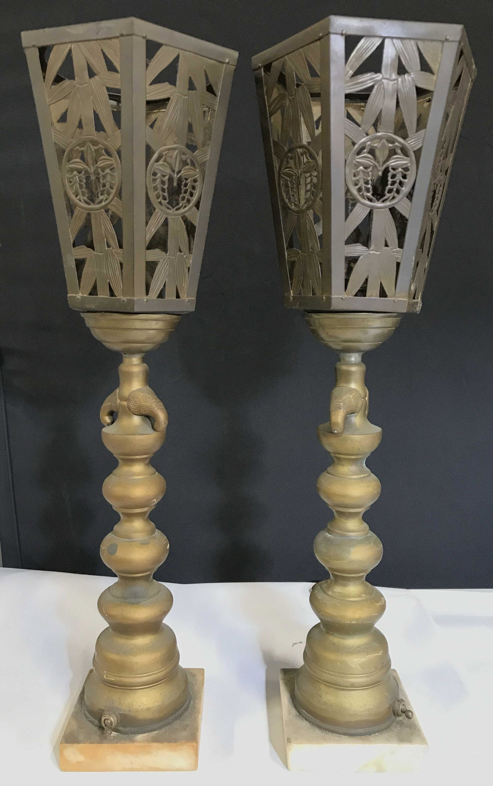 Pair Vintage Brass Candlestick Style Lamps: Lamps are vintage possibly antique. Each are gold toned & possibly brass. Each measures approximately 20.5 inches tall 6 inches wide. Bases of lamps appear to be marble. Vintage lamps, candlestick sty