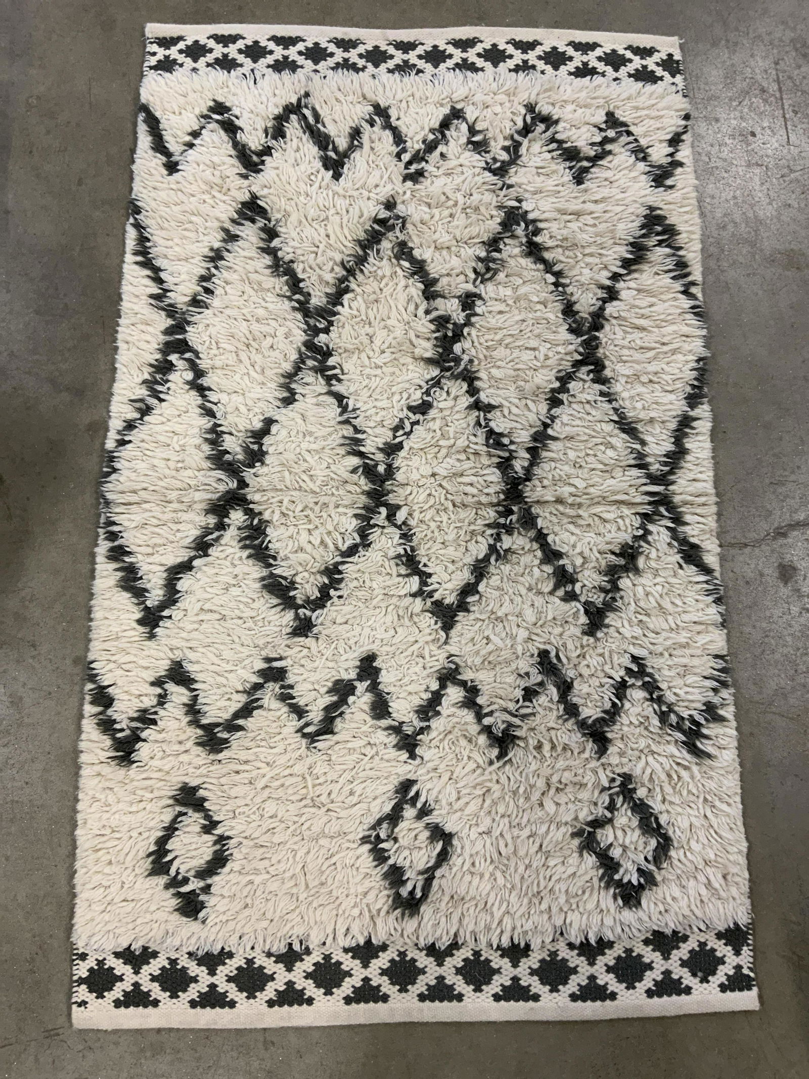 Handmade Wool Carpet: Handmade carpet, possibly vintage. Measures approx 62 inches long, 37 inches W. Wear is consistent with age and use. Shag rug, area rug, handmade rug, carpets, wool carpet, home decor. 9