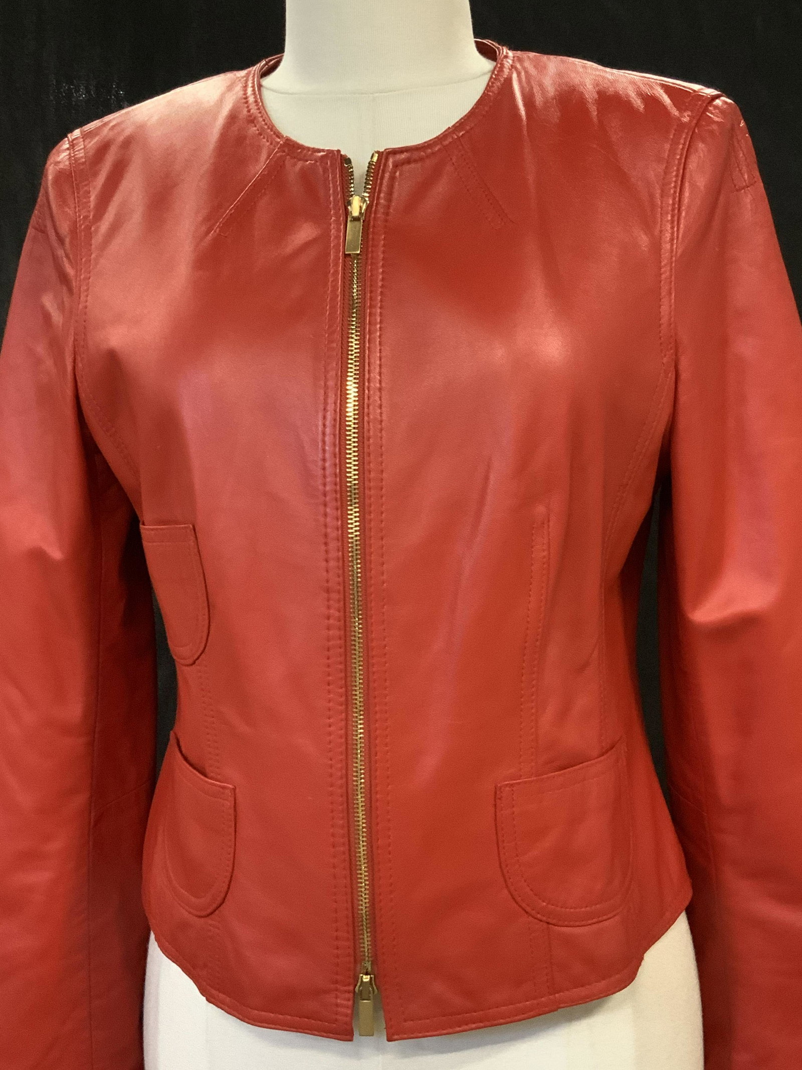 JONES NEW YORK Red Leather Jacket: Size Med, designer labeled, fully lined, lightweight, crew neck, soft hand leather, exterior ticket pockets, smooth zipper, contemporary fashion style. 21 in long. Vintage Contemporary Style clothing,