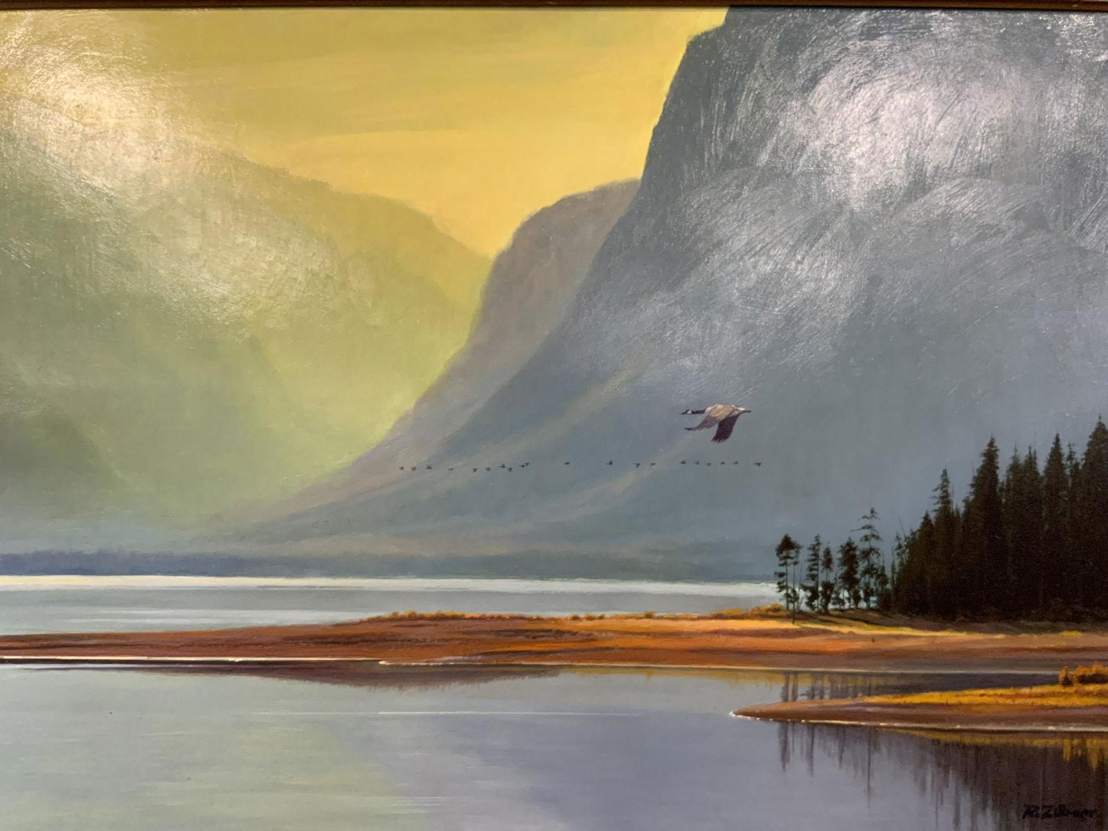 ROLF ZILLMER Signed Oil Painting Artwork: ROLF ZILLMER Signed Oil on Masonite Painting, signature to lower right reads ‘R Zillmer’, subject a lake and mountainous landscape, measures 31 3/4 x 44 inches, wooden frame, surface wear to frame