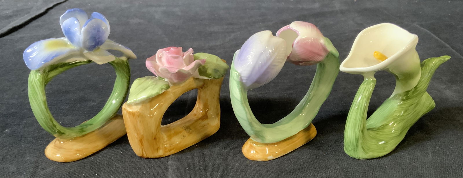 Set 4 PIA Bone China Napkin Rings: Set 4 PIA Bone China Napkin Rings, labels read ‘Bone China PIA Philippines’, all measure approximately 2 1/4 x 2 7/8 inches, surface wear and losses to some pieces, Napkin ring, napkin holder, tab