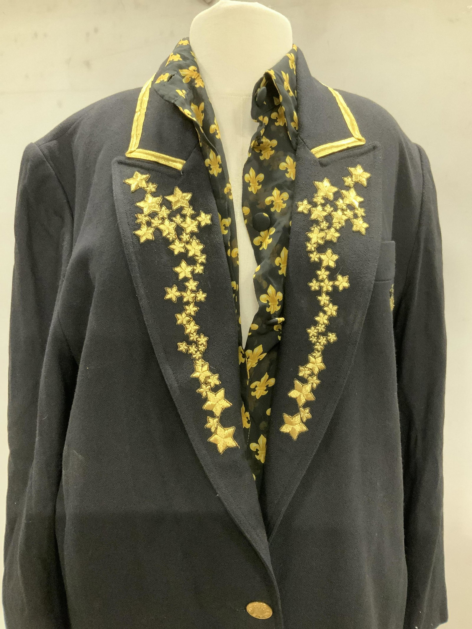 CRISCIONE Star Blazer, Fleur De Lis Sheer Blouse: Black rayon blazer with embroidered gold thread stars on shawl collar , waist app 38-39 in, length 28 in. Sheer black long sleeve blouse with gold fleur de lis print. App 44 in wide at waist. Ladies s