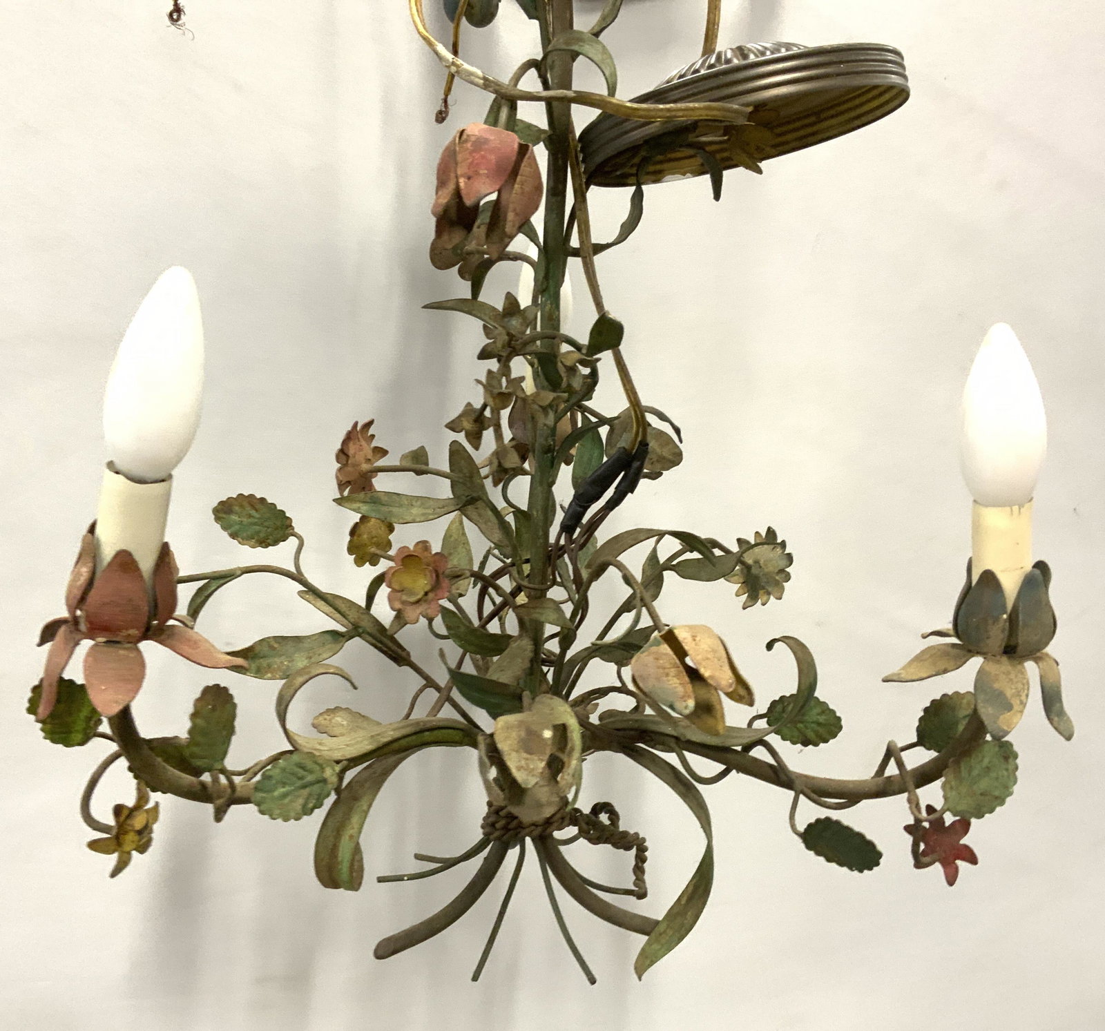 Vintage Hand Painted Floral Metal Chandelier: Vintage, possibly antique, chandelier. Possibly french. Hand painted, crafted to resemble a floral bouquet. Measures approx 22 inches H, and 16 inches W. Wear is consistent with age and use. Property 
