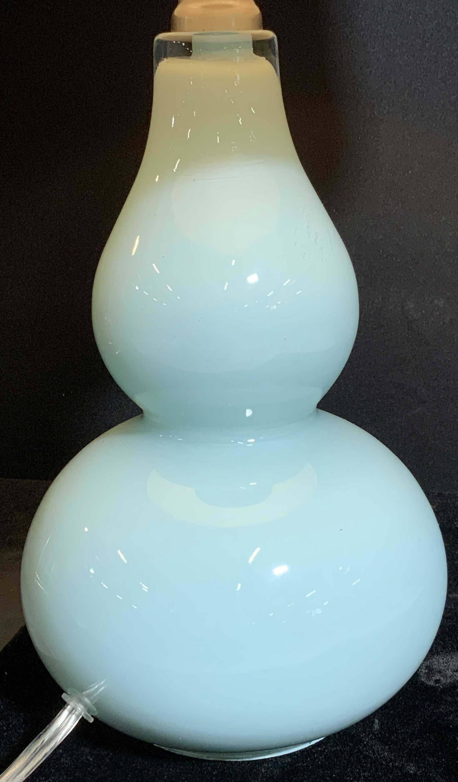 Double Gourd Glass Lamp w Shade: Aqua blue art glass pedestal lap with hard shell white linen shade. 17.5 in ht, shade 9.5 in wide. Needs base, glass hallow on verso. Shade new. Working condition. Lamps, lighting, table lamp, double 