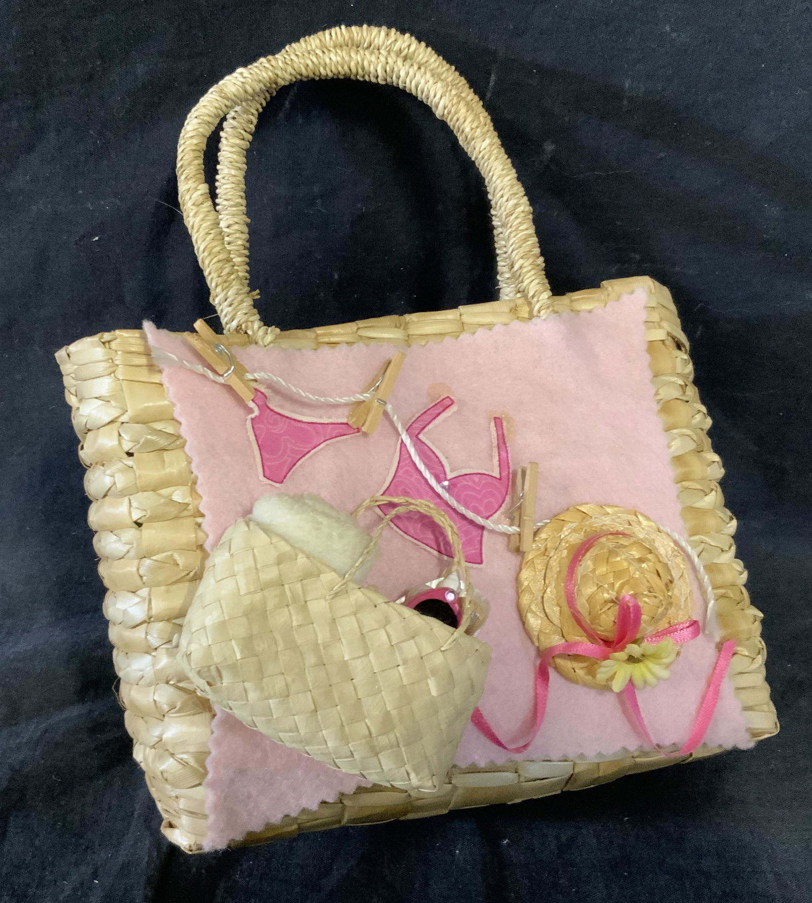 Children’s Basket & Coin Purse: Children’s basket and coin purse, lot includes a miniature basket with decorative objects attached to the outside and a pink coin purse to the interior, basket measures 6.5 inches wide and 5.5 inche