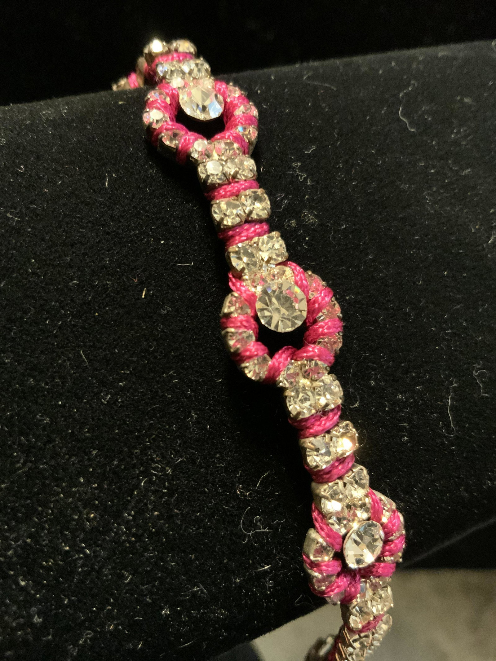 Hot Pink Crystal Rhine Stone Encrusted Bracelet: Vintage costume jewelry, circular and square link chain with inset crystal rhinestones, hot pink threaded accents, measures length app 7 inches, width app .5 inches, property of Trump Tower Manhattan 