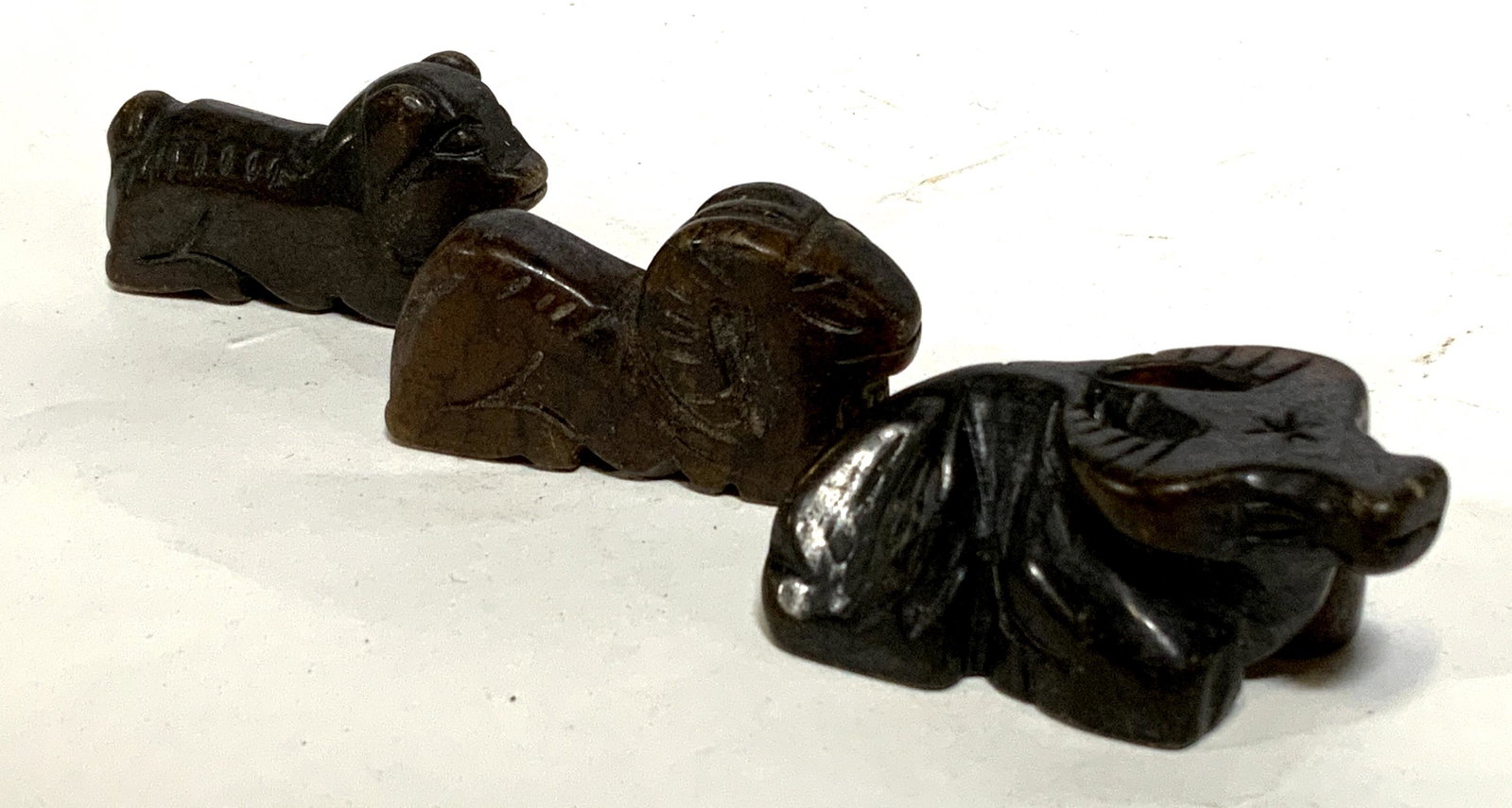 Lot 3 Chinese Ram, Ox, & Pig Beads: Lot 3 Chinese Ram, Ox, & Pig Beads, no apparent inscriptions or marks, ox measures 7/8 inches tall x 2 inches at widest point, ram measures 1 inch tall x 1 7/8 inches at widest point, pig measures 1 i
