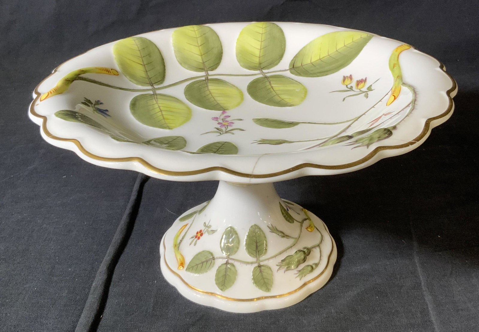 ROYAL WORCESTER Bone China Tazza: ROYAL WORCESTER Bone China Tazza, inscriptions read ‘The Blind Earl Circa 1770 Royal Worcester Bone China Made in England’, measures 5 inches tall x 9 1/2 inches in diameter, surface wear to piece