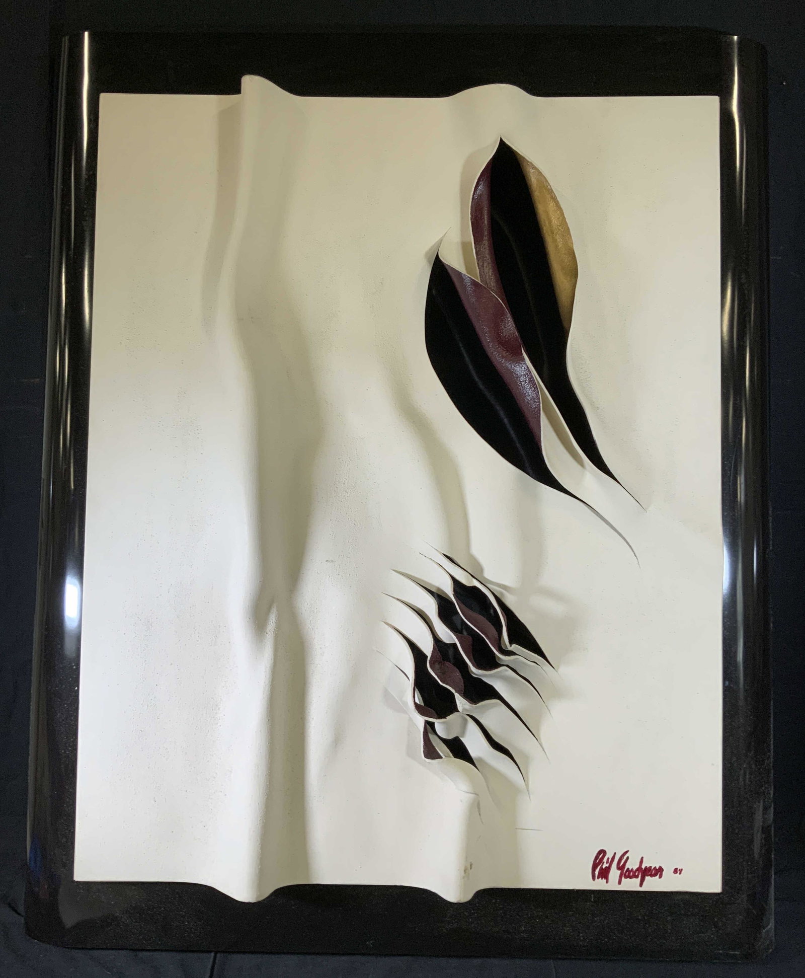PHIL GOODYEAR Signed Mixed Media Relief Sculpture: PHIL GOODYEAR Signed Mixed Media Relief Sculpture, signature to lower right reads ‘Phil Goodyear 84’, subject a panel with negative raised spaces, measures 48 x 39 1/2 inches, affixed to composite