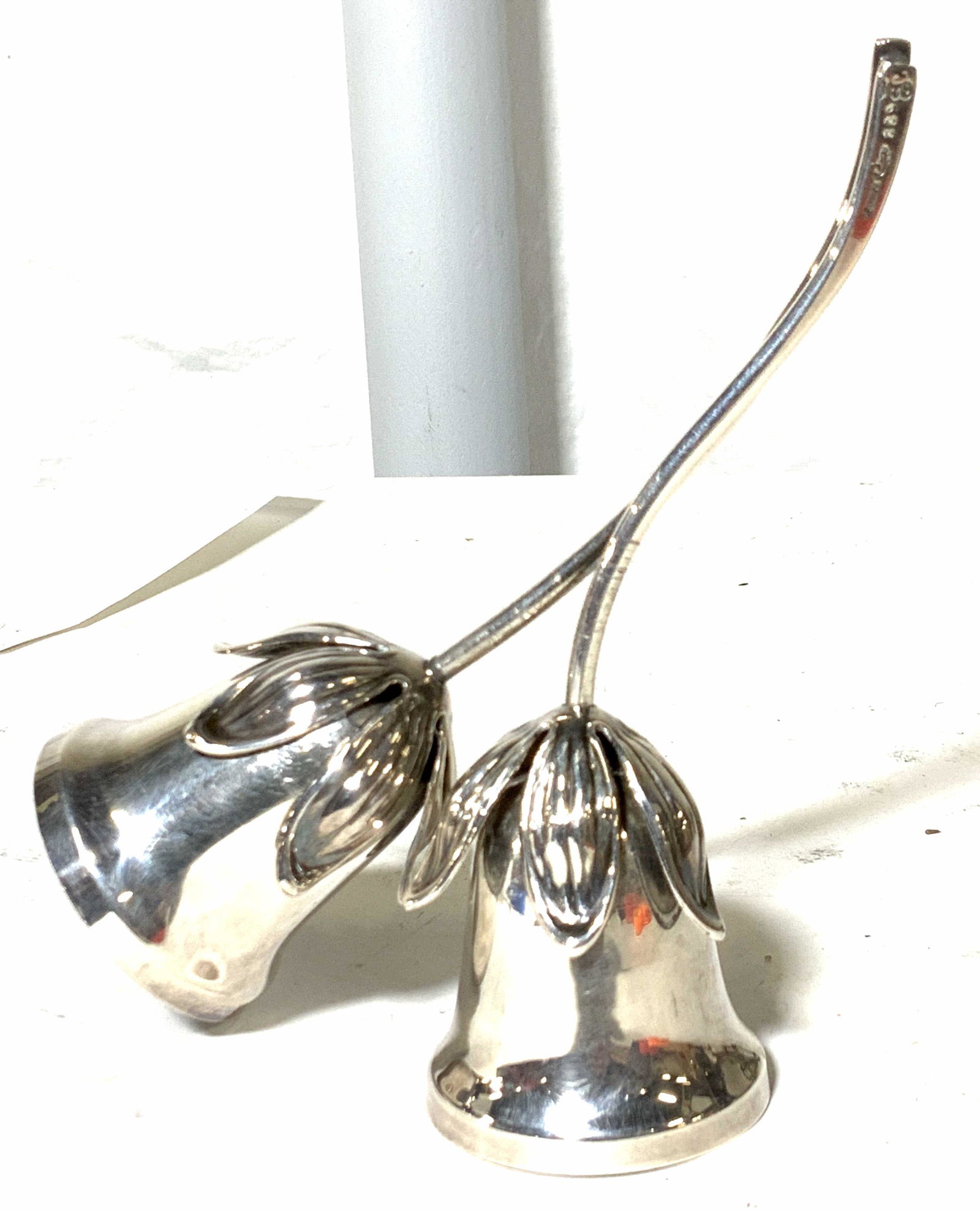 Silver Plate Hans Jensen Signed Bells, Denmark: Silver plate bells, calling bells, dinner bells, decorative arts, signed Denmark on handle with multiple stamps, including whale stamp and labeled EL 889. 6.5 in ht, 5 in wide. Whale mark is for Hans 