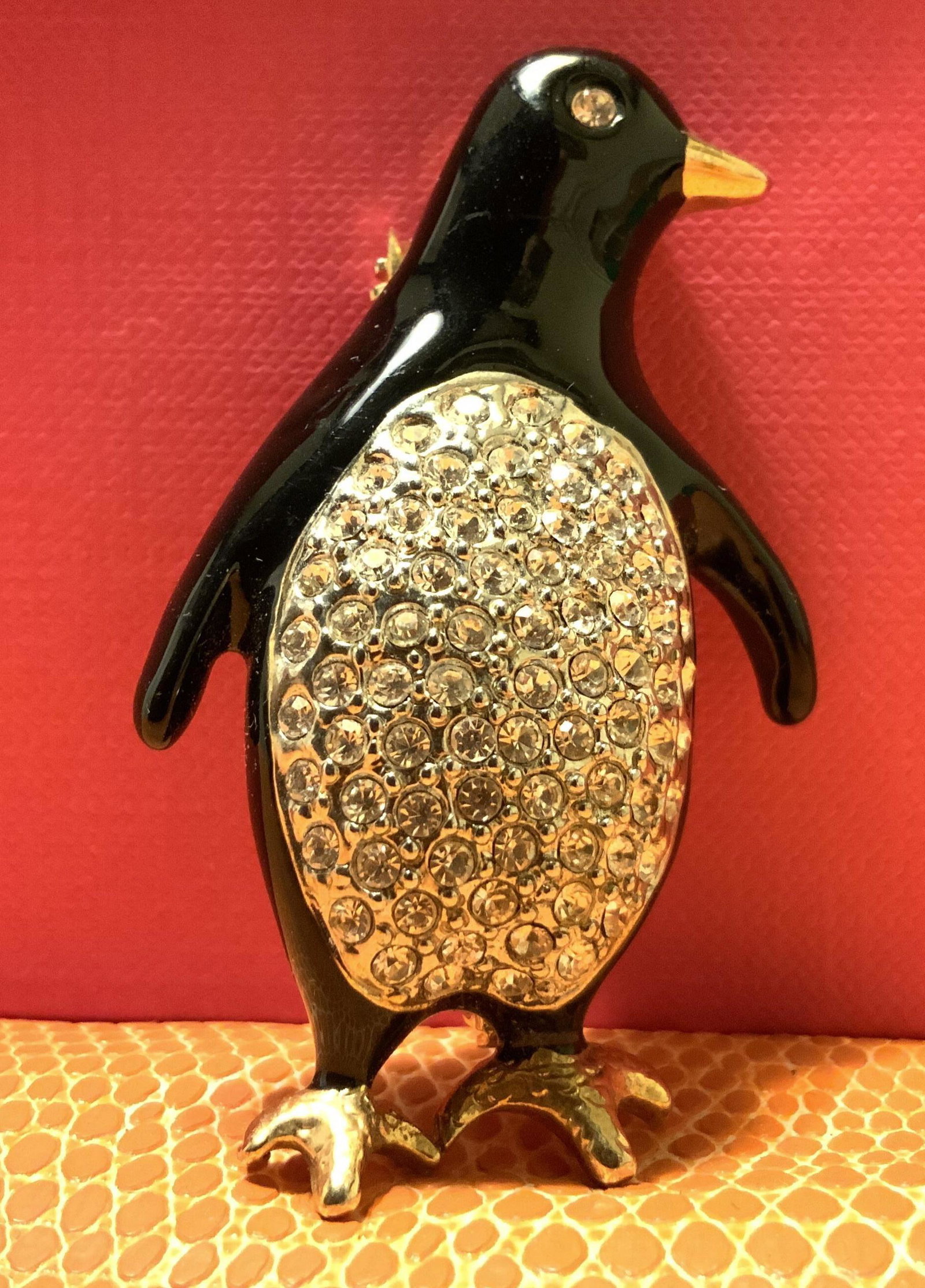 Enamel Crystal Penguin Brooch Jewelry: Vintage penguin form pin, brooch, jewelry, gold tone framing with inset crystal rhinestones, black enamel, and gold tone beak and foot accents, estate jewelry, property of Palm Beach Florida Estate, c