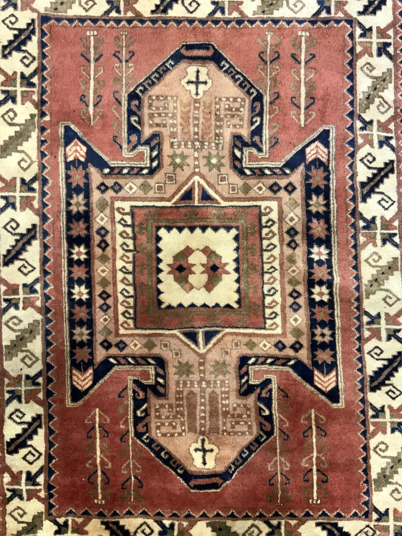 Vintage Handmade Turkish Wool Rug: Rug is vintage possibly antique. Piece is wool. Rug has intricate multi toned geometric detail. Rug has fringes. Piece measures approx 62 inches long 41 inches wide. Rug, carpet, wool rug, vintage rug