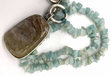 KC Natural Stone Chip Necklace w lrg Quartz Pend.: KENNETH COLE Fashion jewelry , adjustable length 18 in. longest length, KC impressed onto one of the rings. Natural blue stone polished chops with large artisanal pendant wrapped in silver toned metal