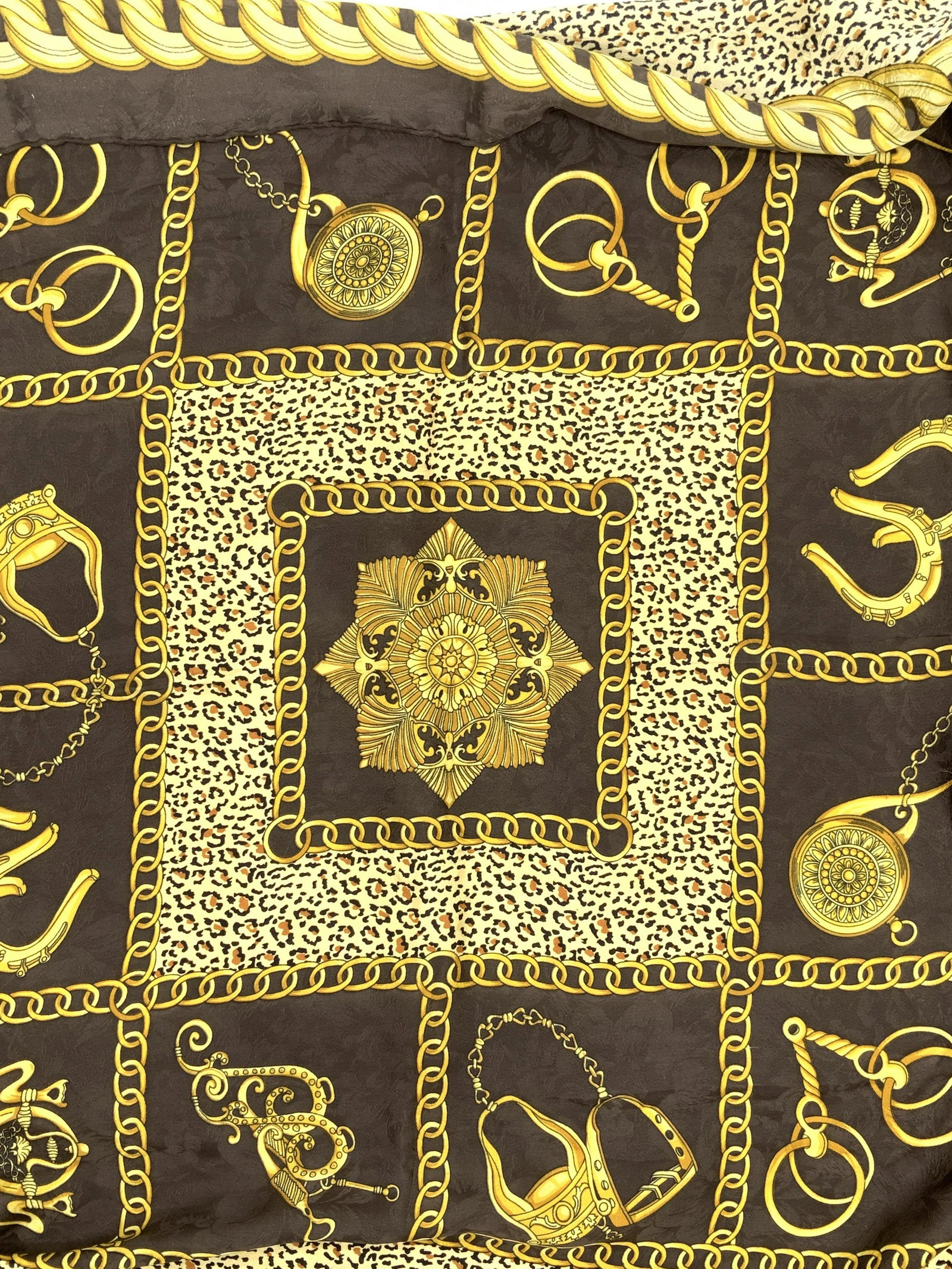 Animal Print Chain Link Silk Scarf: Gold and Brown silk scarf with animal print, chain links, scrollwork with horse stirrup decor. Hand rolled and hand sewn edges. Damask silk. 33.5 in. silk scarf, Animal print and horse stirrup Scarf, 
