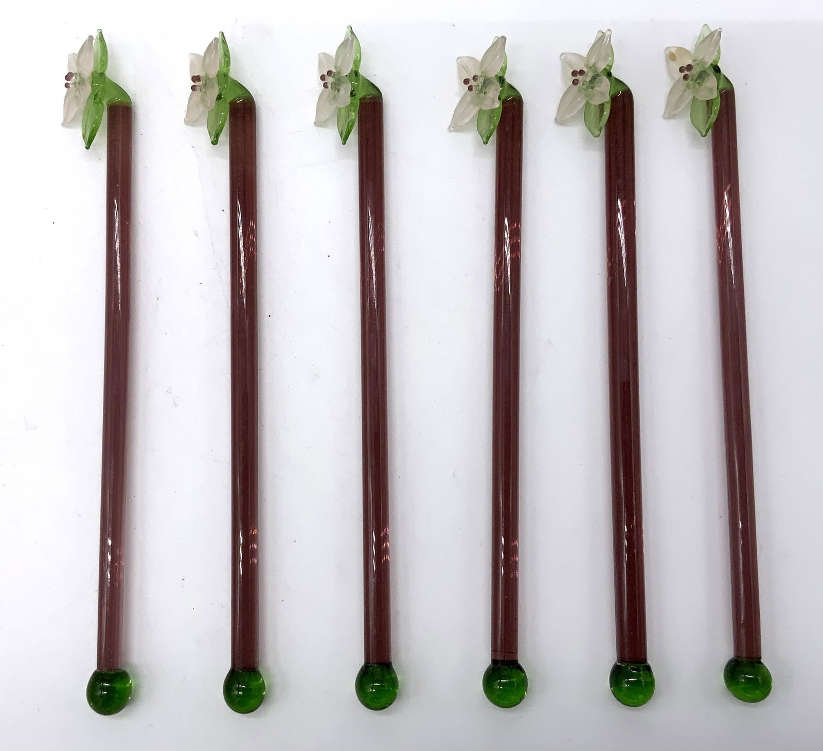 Set 6 Glass Cocktail Drink Stirrers: Set 6 Glass Drink Stirrers, no apparent inscriptions or marks, drink stirrers feature white floral accent, all measure 6 inches long, surface wear to pieces, Drink stirrer, coffee stirrer, art glass,