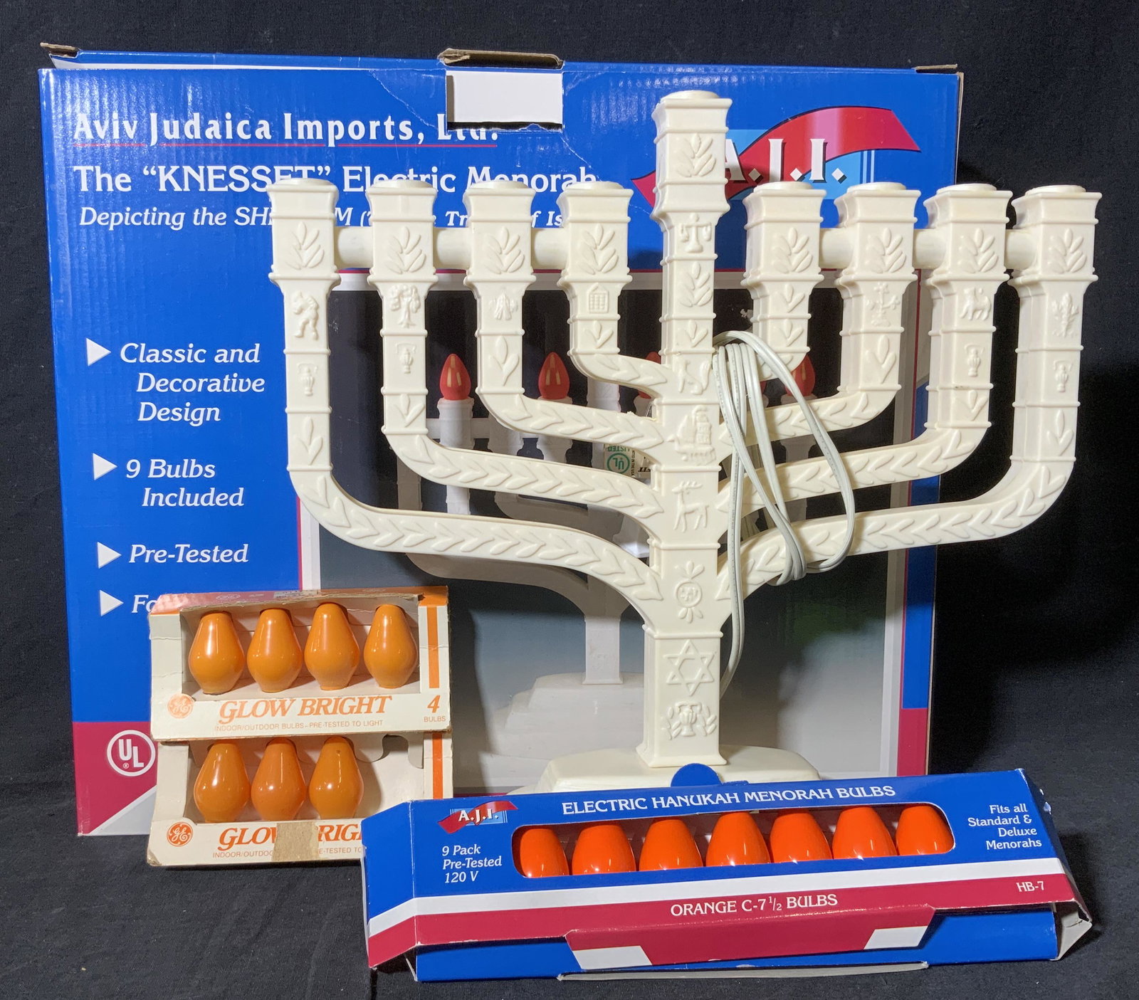 The ‘KINESSET’ Electric Menorah: The KINESSET Electric Menorah, menorah comes in original package, lot consists of a plastic menorah two small sets of light orange light bulbs and a 9 pack set of dark orange bulbs, none of lot tested