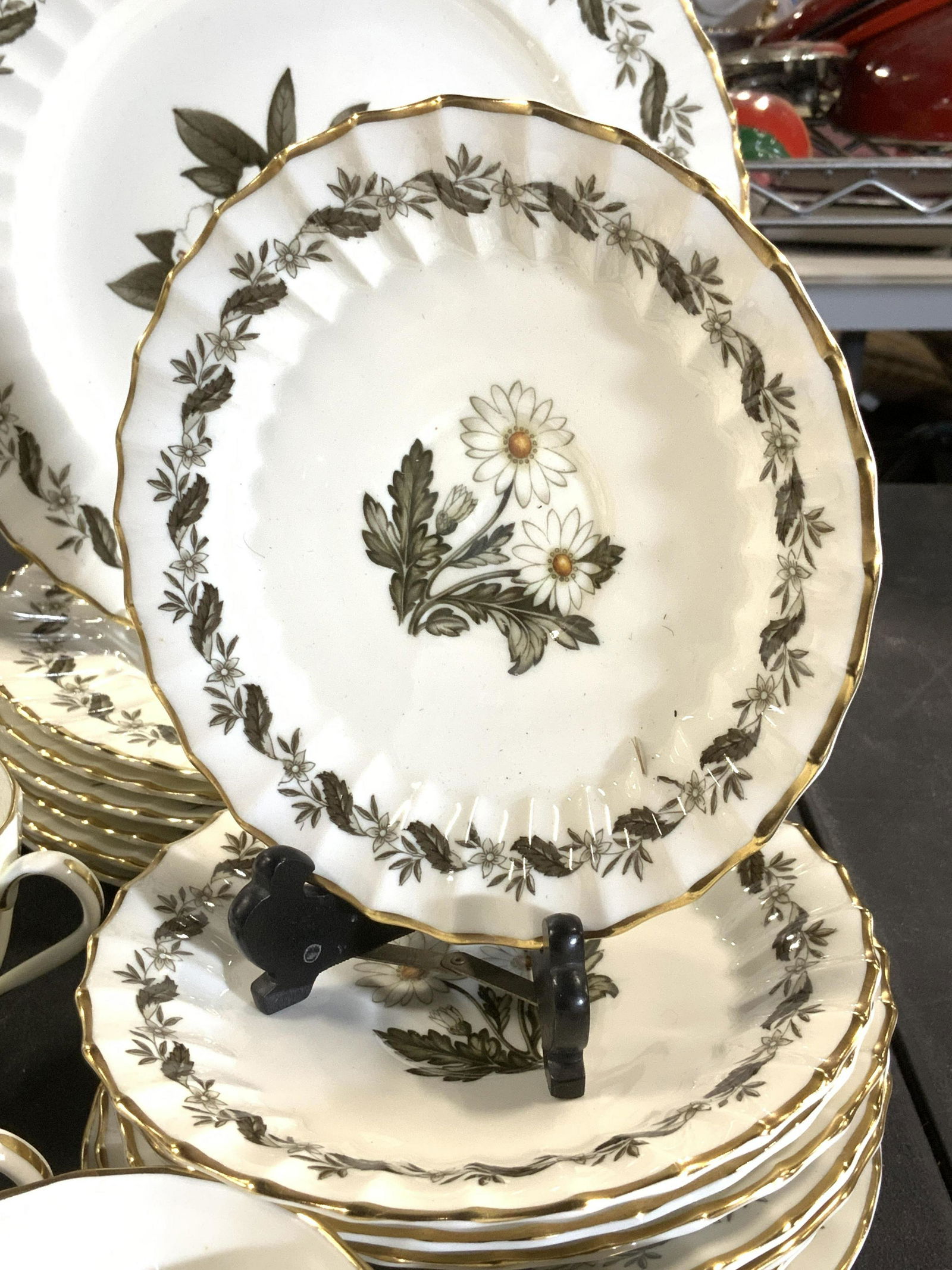 ROYAL WORCESTER ‘ Engadine’ Chinaware 43, England: Bone China Tableware, Set of Dinner plates, tea cups with saucers, creamer and open top sugar bowl. Cream color with center white flowers. Pattern Engadine. 14 dinner plates with solid gilt rim, 9 1/8