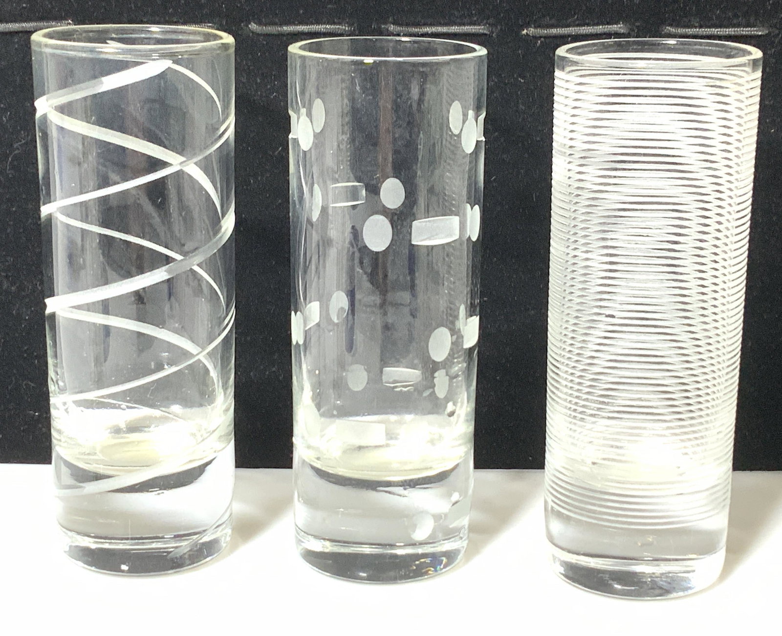 Mid Century Etched Glass Shot Glass Set 6: Retro set of shooter style tubular shot glasses, each with different Etched pattern and Art Deco vibe. 4 in ht. Mid century Barware, Etched pattern Glass Shooter Shot Glasses, Art Deco Vintage Shot gl