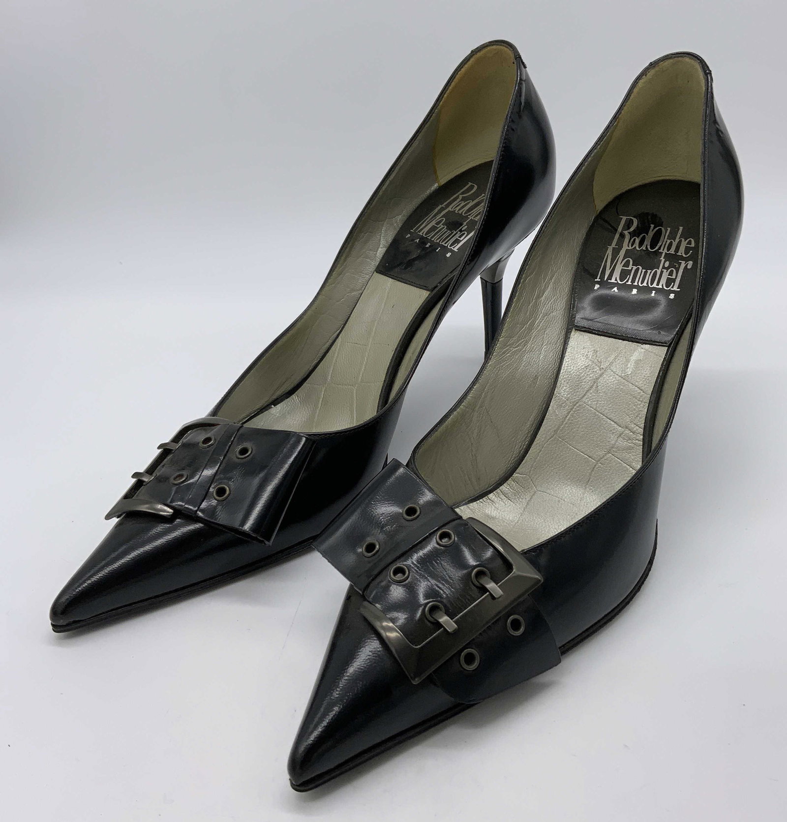 RODOLPHE MENUDIER Pointed Toe Leather Heels: RODOLPHE MENUDIER Pointed Toe Leather Heels, Inscriptions read ‘RODOLPHE MENUDIER Paris’ and ‘Made in Italy 39 1/2’, height of heel: 3 1/2 inches tall, surface wear to pieces, comes in origina