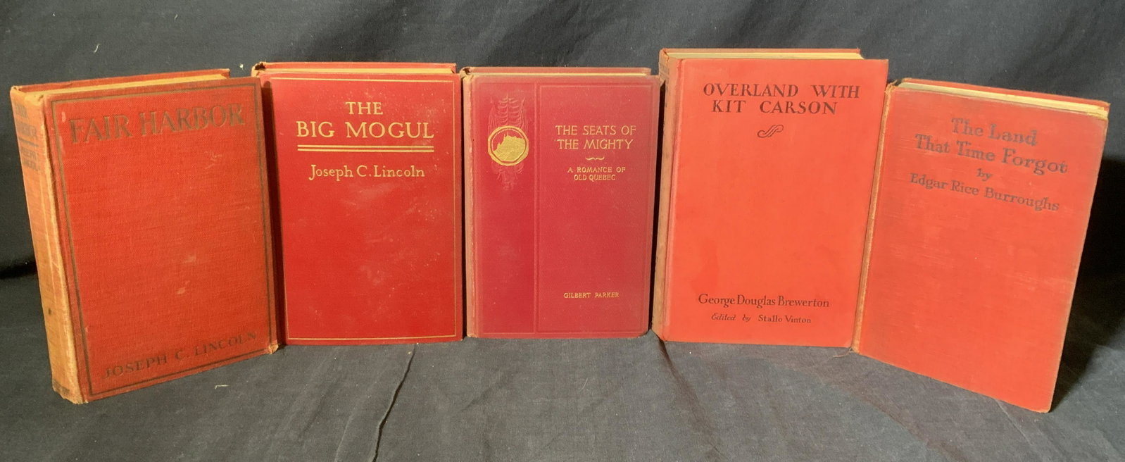 Group Lot 5 Vintage Books: Group Lot 5 Vintage Books, vintage possibly antique, titles in lot include ‘The Land That Time Forgot’ ‘Overland with Kit Carson’ ‘The Seats of The Mighty’ ‘The Big Mogul’ ‘Fair Harb