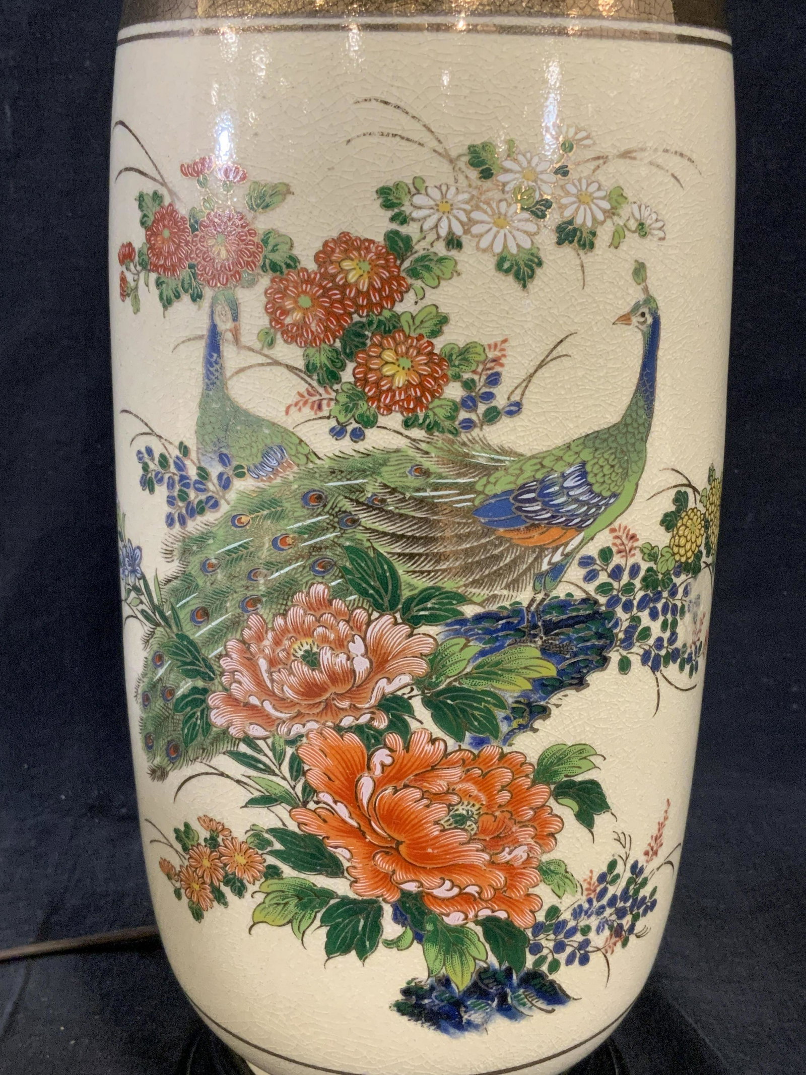 Porcelain Floral & Peacock Lamp: Porcelain Floral & Peacock Lamp, piece measures approximately 16 inches at tallest point, no harp or lamp shade, has black painted wooden base with chips to it, body of lamp made of a creme colored po