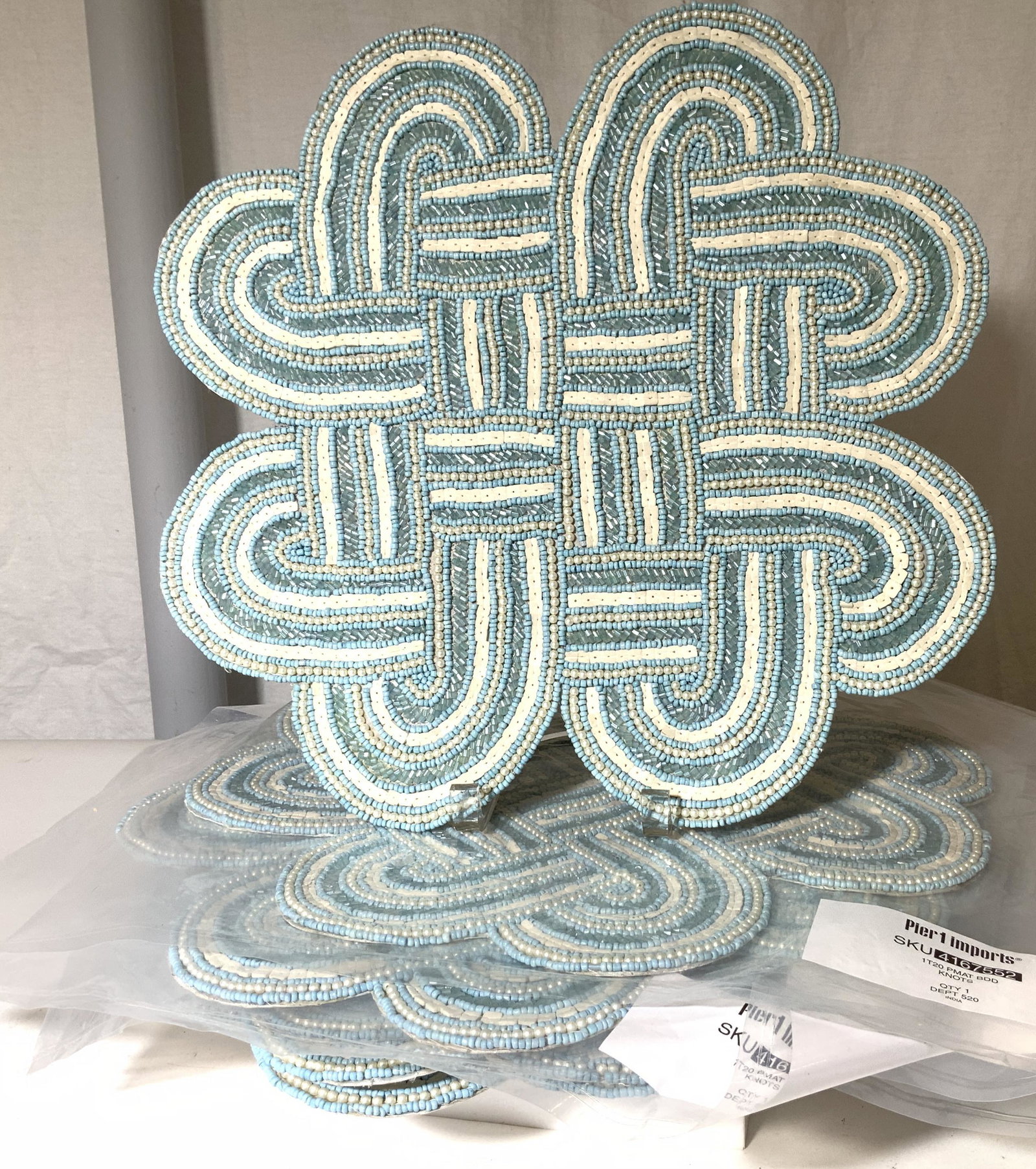 Set 10 Never Used Beaded Pier 1 Placemats: Pier 1 Imports Knot Design Beaded Placemats ( Style Napperon). Turquoise, white and costume Pearl beads hand threaded, 4 in original packaging with original tag. Others, possibly lightly used and with