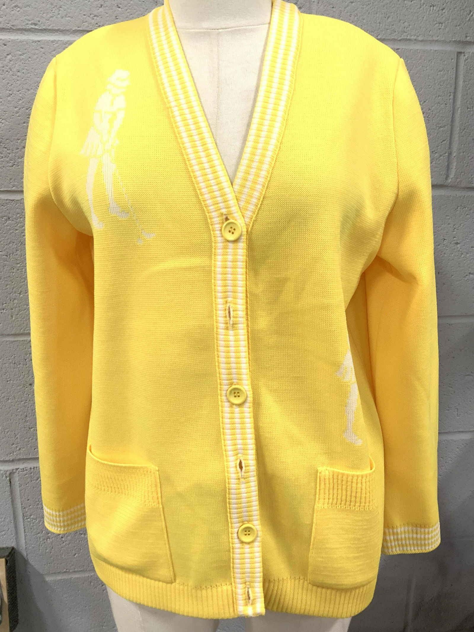 Lot 5 Never Worn Tops, Versace & Others: All never worn yellow ladies wearables, most in original packaging, some removed for photography and cataloging. Lot consists of Victoria’s Secret Alpine Fleece Crop Hoodie , size Small. Apparel Ind