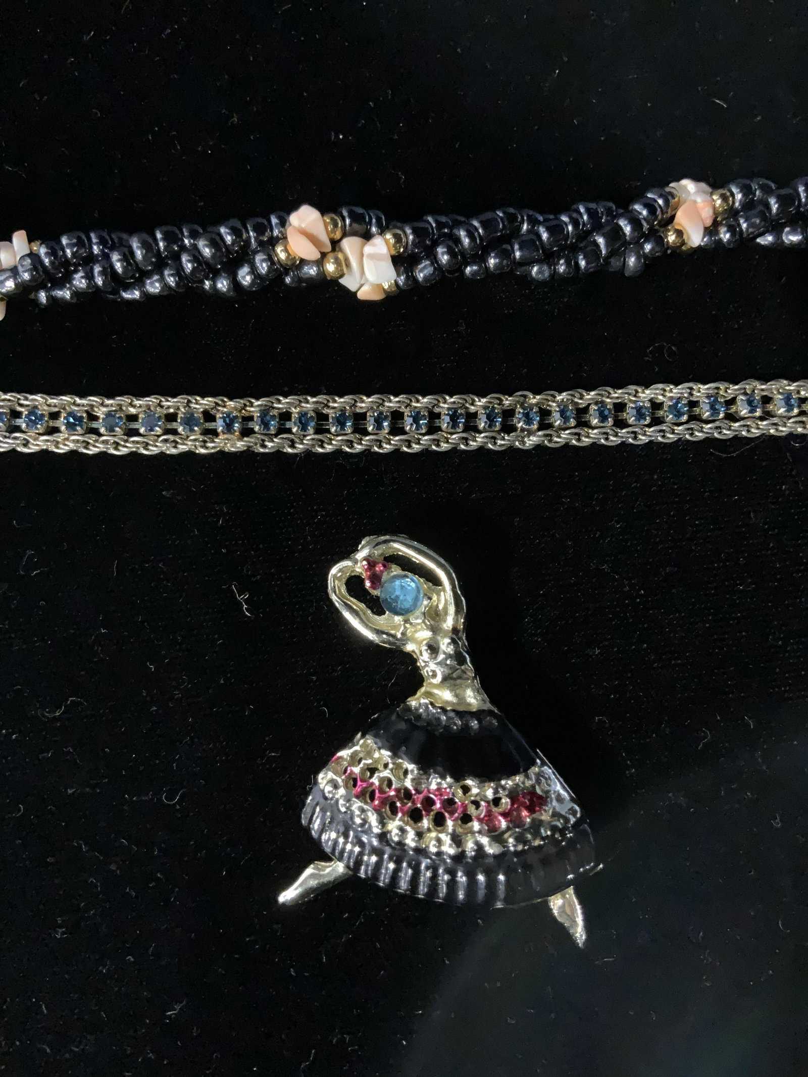 Lot 3 Jewelry, Bracelets & Brooch: Lot 3 Bracelets & Brooch, no apparent inscriptions or marks, pin measures 1 7/8 inches long, beaded bracelet with spring clasp measures 7 1/8 long, blue rhinestone bracelet with fold over clasp measur