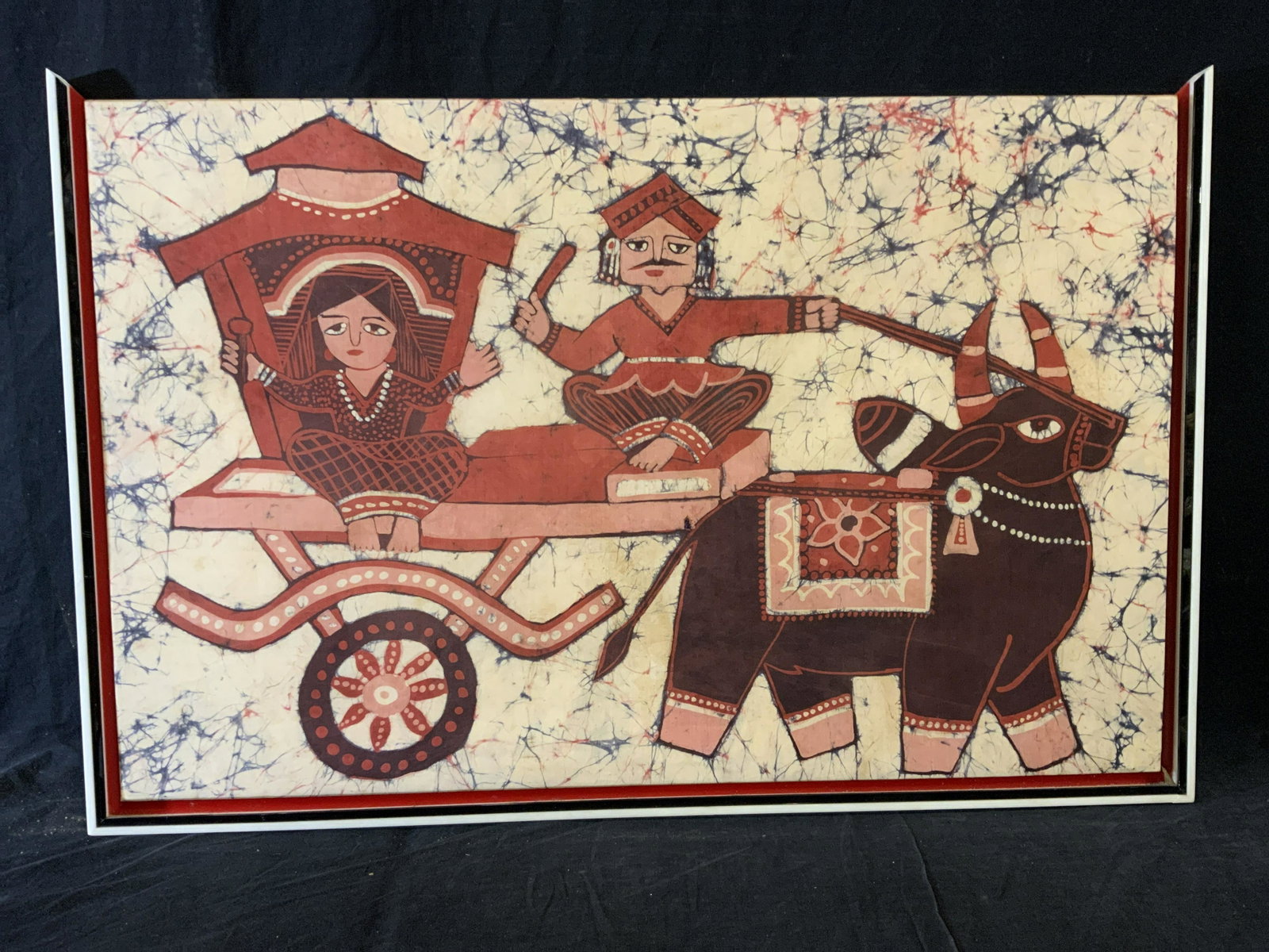 Framed East Asian Print on Fabric: Framed East Asian Print on Fabric, no apparent inscriptions or markings, subject a man and a woman seated on a cart being pulled by an ox. composite white and red floating frame, top border of frame m