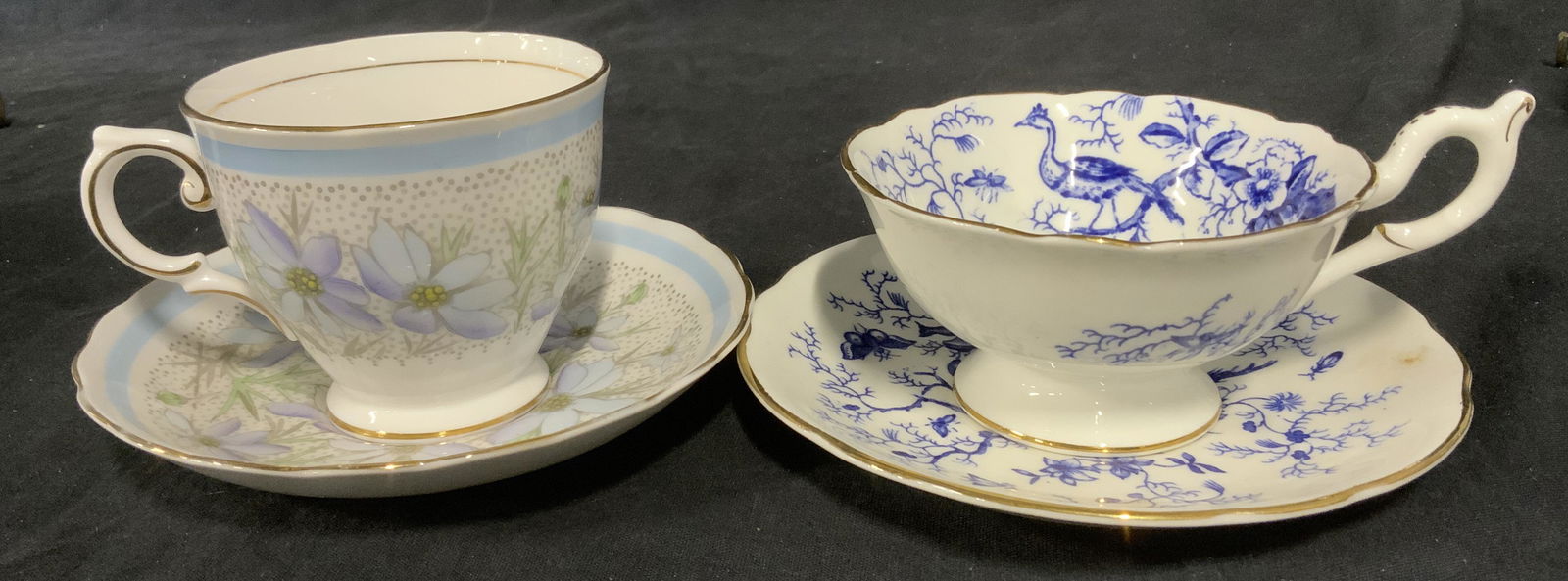 4 pc Ceramic Tea Cups & Saucers: Four piece lot. Includes 2 cups and 2 saucers, all appear to be hand painted or include hand painted elements. Underside reads as TUSCAN FINE ENGLISH BONE CHINA MADE IN ENGLAND, COALPORT BONE CHINA MA