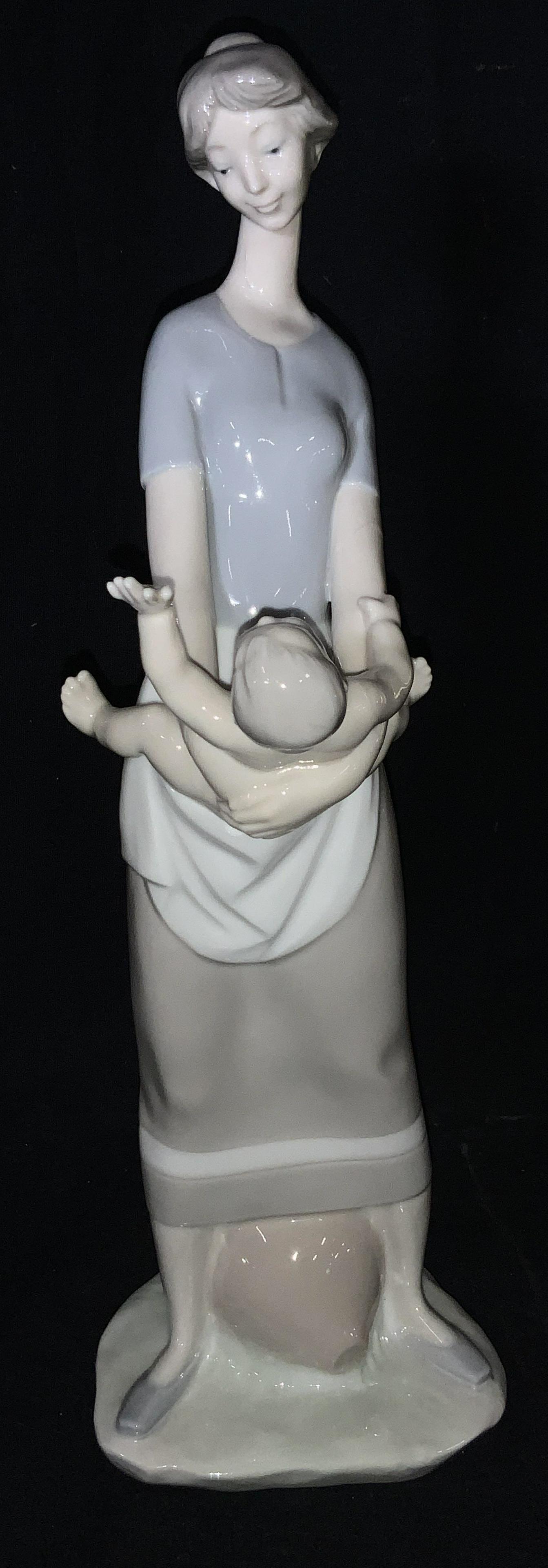 LLADRO ‘Motherhood’ Porcelain Statue, Spain: All lladró are specially made by hand and hand painted, using the finish materials. They are collectibles. This piece is RETRIED, it’s no is 4575 though not on piece. has many other marks, it is si