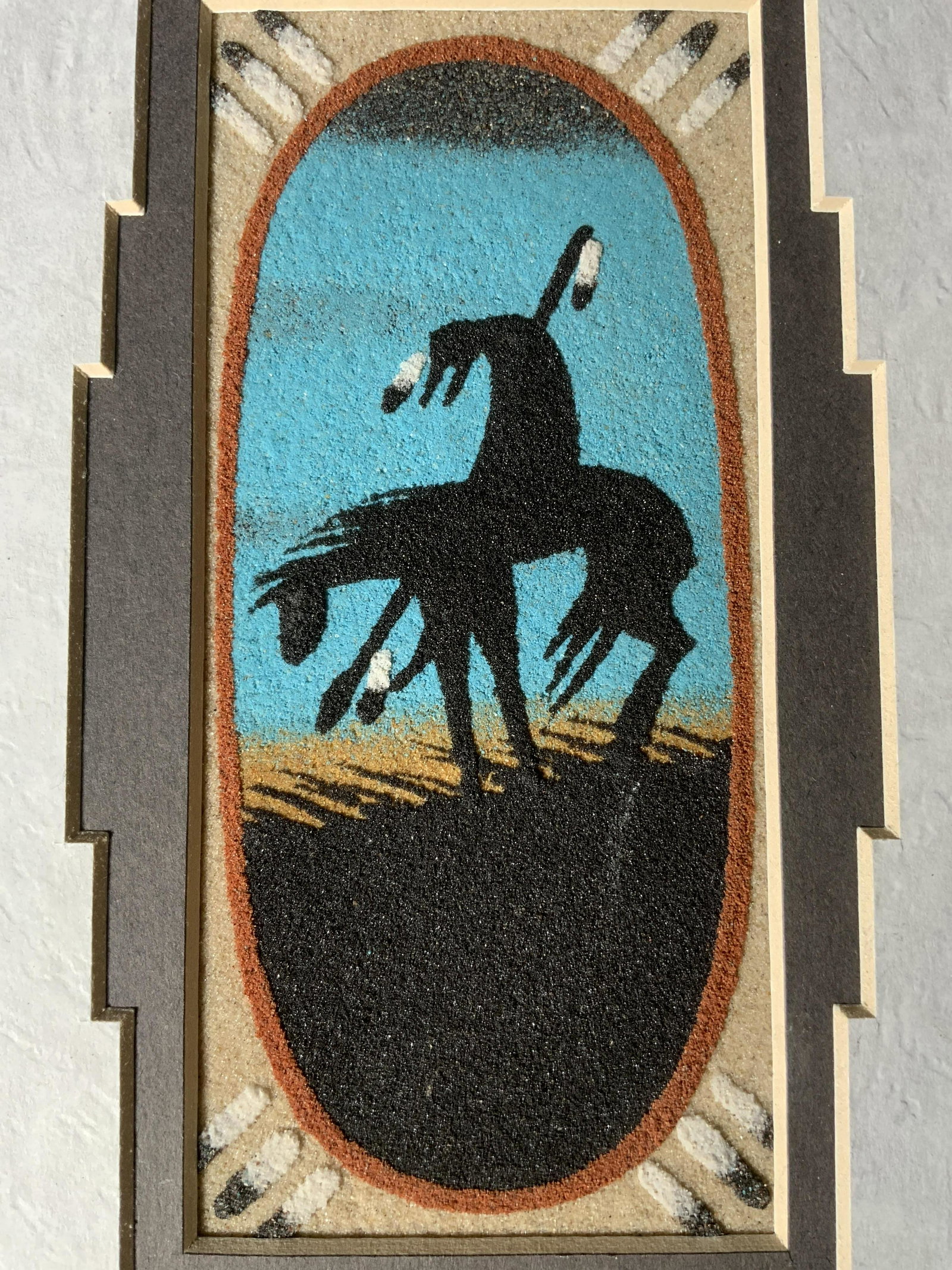 VIRGINIA TYLER Navajo Sandpainting: VIRGINIA TYLER Navajo Sandpainting, label to reverse reads ‘Certificate of Authenticity Virginia Tyler’, historical background of sand painting is detailed, subject a figure atop a horse, measures