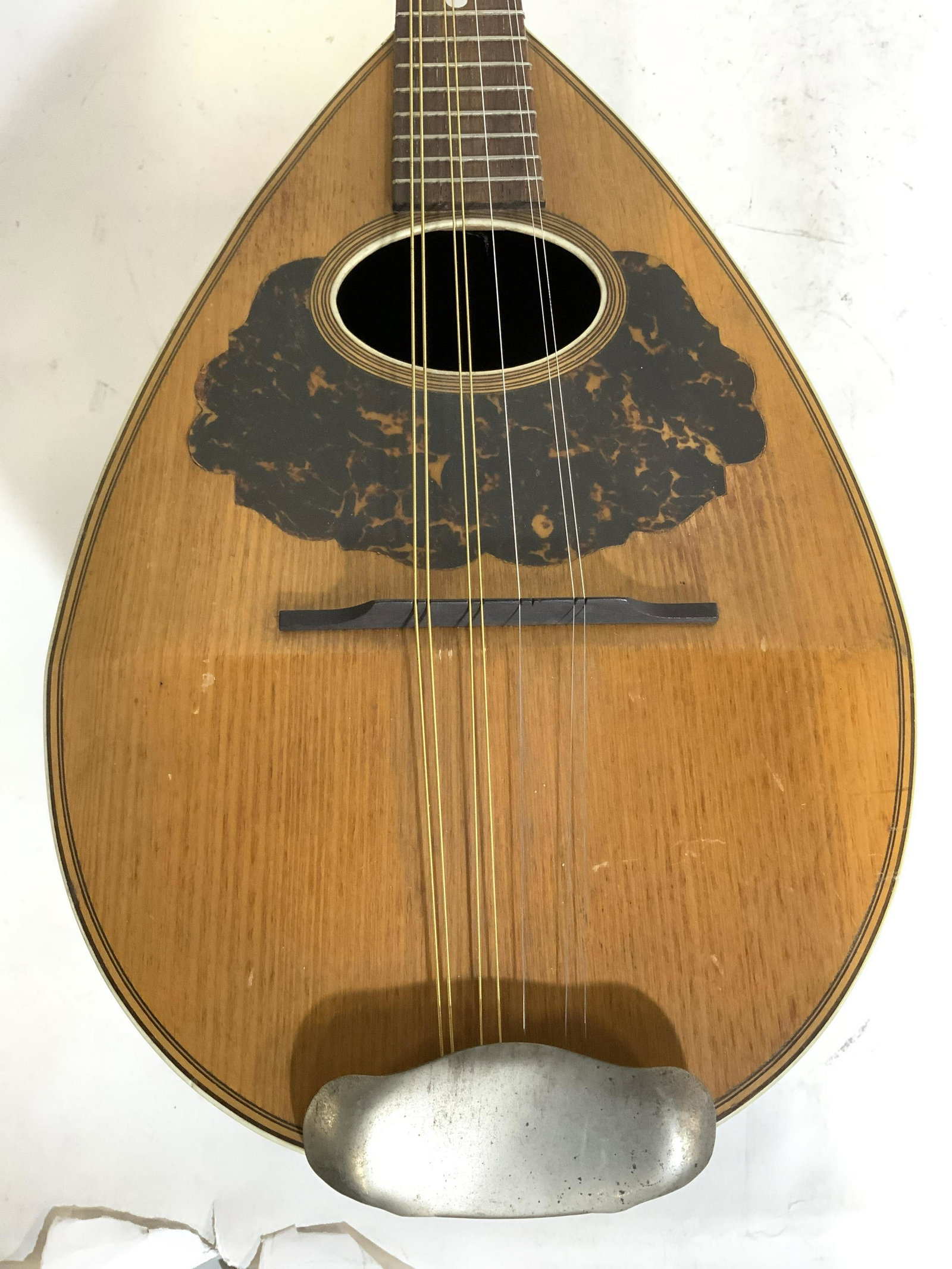 Vintage C BRUNO & SON Mandolin C 1900’s: Interior tag reads C BRUNO & SON NEW YORK. Piece appears to be made of Brazilian Rosewood. Mandolin has bowl style back. Piece has silver & gold toned strings. Tuning knobs are cream toned, and are po