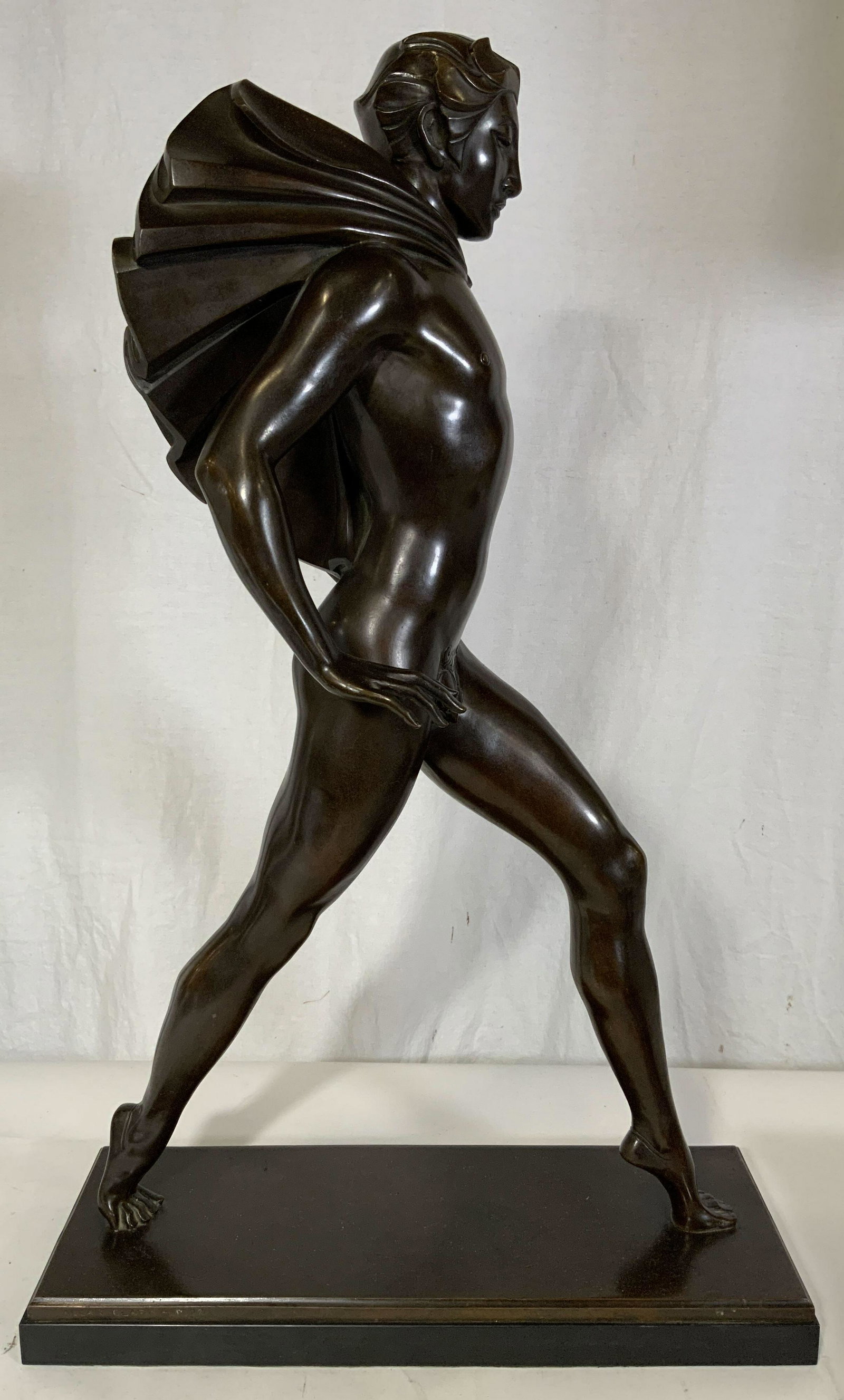 ALLAN CLARK Bronze Male Nude Sculpture 1927: ALLAN CLARK Bronze Male Nude Sculpture 1927, inscription reads Â‘Allan Clark 1927 #3Â’, subject a male nude mid step, measures 23 1/2 x 14 3/4 inches wide at base, surface wear to piece, Propert