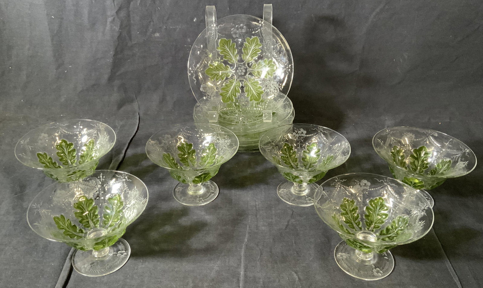 Set 14 Crystal Desert Bowls & Dishes, England: Set 14 Crystal Desert Bowls & Dishes, England, inscription to base reads ‘England’, pieces feature leaf motifs, bowls measure 3 1/8 inches tall x 4 3/4 inches in diameter, dishes measure 6 1/2 inc