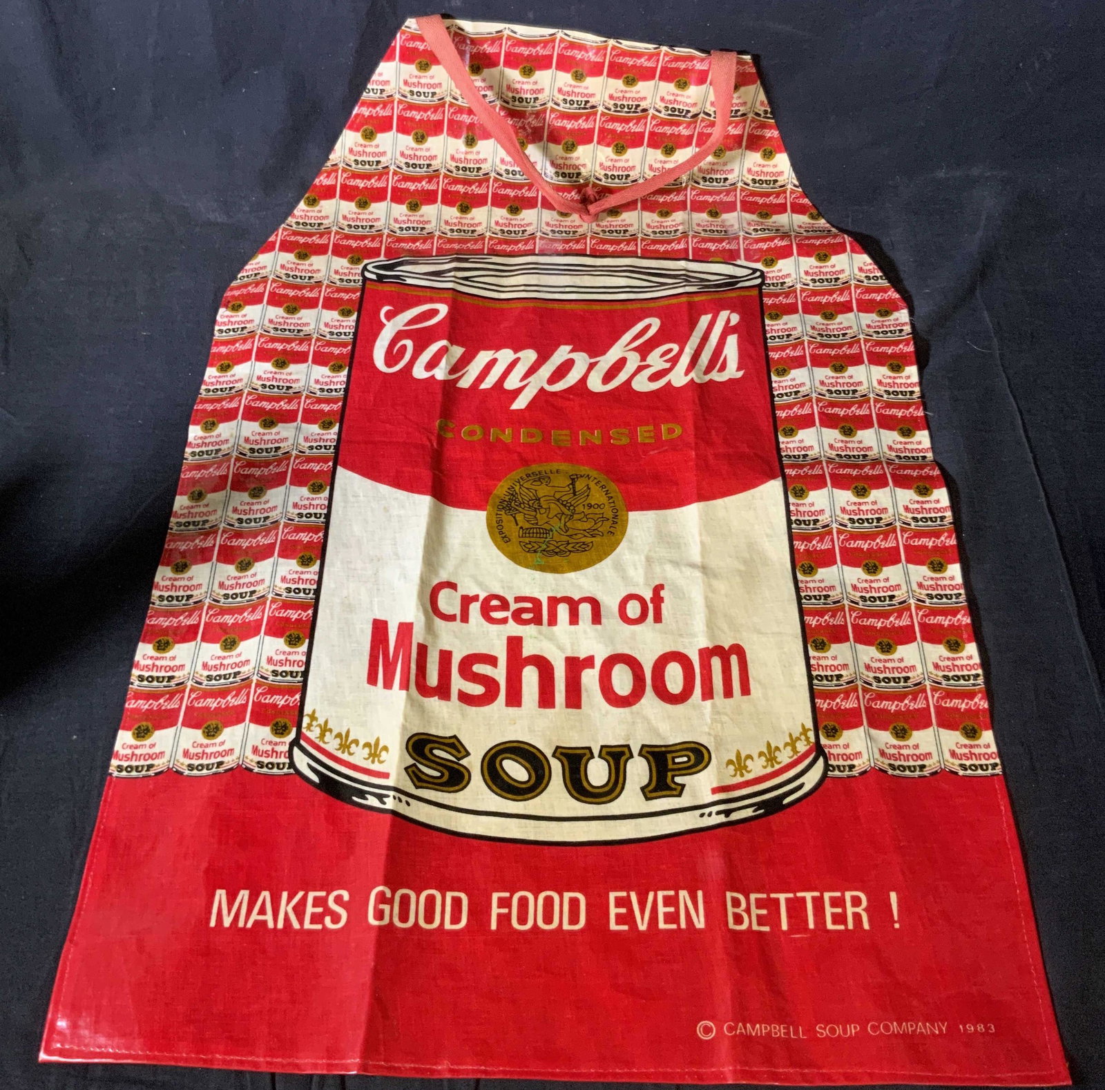 Collectible CAMPBELL’S SOUP Cotton Pop Art Apron: A vintage collectible Campbell’s Soup pop art apron. The obverse features the iconic Campbell’s Soup colors and designs. Reverse side tag reads POP ART APRON COLLECTION, ESPECIALLY MADE FOR CAMPBE