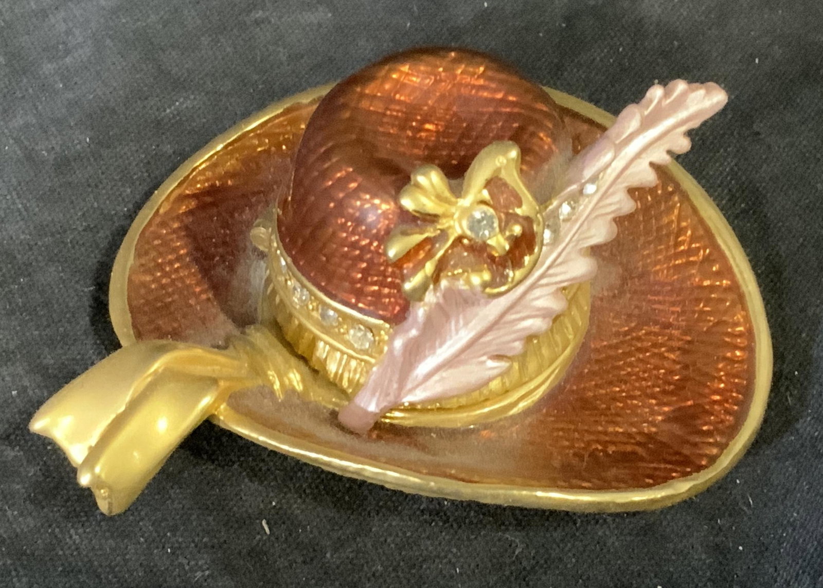 Group Lot 13 Tabletop Accessories & Oddities: Group lot 13 tabletop accessories and oddities, lot includes a glass peach, a stone spotted fruit, a glass strawberry, a wine stopper, a candle in a glass container with metal bottom, a salt shaker, a