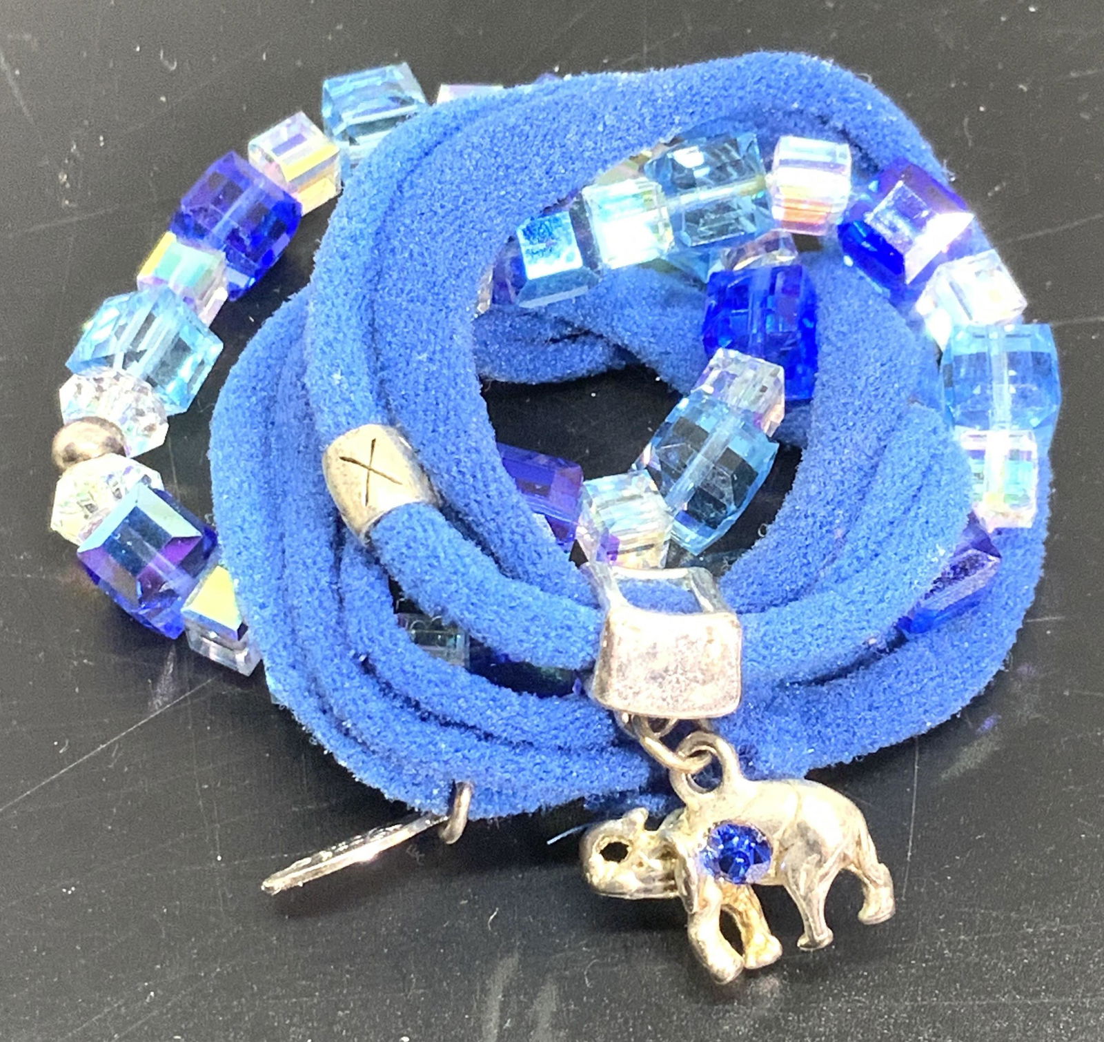 Austrian Crystal, Elephant Charm Bracelets: Cool Jewels Stretch Bracelet/ Hair band/ Anklet with Elephant Charm that has Blue Crystal solitaire. Stretch Fabric. Cubic Austrian Crystal Beaded Bracelet with alternating light and royal blue beads
