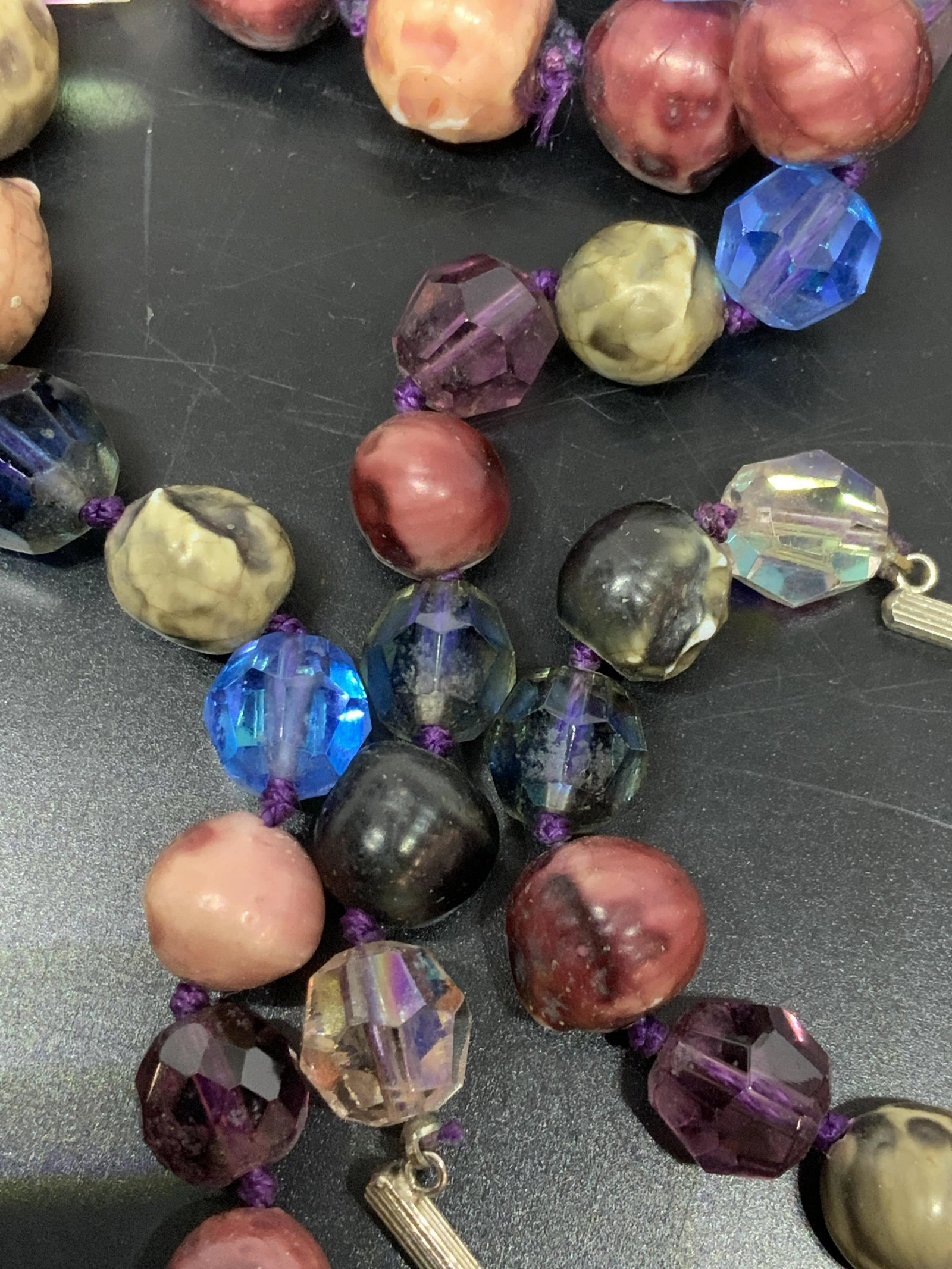 Hand Strung Beaded Costume Necklace Jewelry: Double Strand Choker ( needs hook) or one long strand necklace, 30 in., full of iridescent and faceted costume beads, double knotted. Up cycle for beads. Property of New Canaan, CT Estate Vintage Jewe