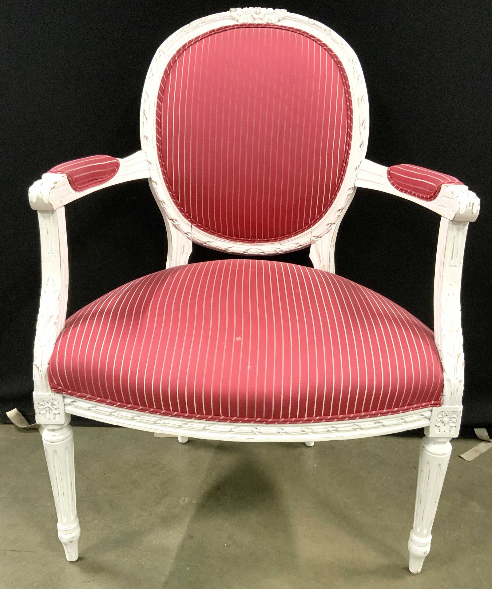 Vintage Victorian Style Upholstered End Chair: End chair is vintage. Piece has Victorian style. Piece has pink toned upholstery with stripe detail. Piece has white toned carved wooden frame. Edges of upholstery have double welting. Chair, vintage 