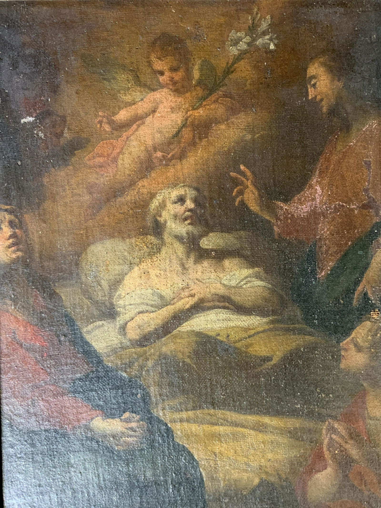 Christian Oil Painting Artwork: Christian Oil on canvas Painting, possibly antique, inscription to reverse illegible, subject a putti with lilies over a man in bed, gilt wooden frame, surface wear and losses to frame, 23 in by 16 1/