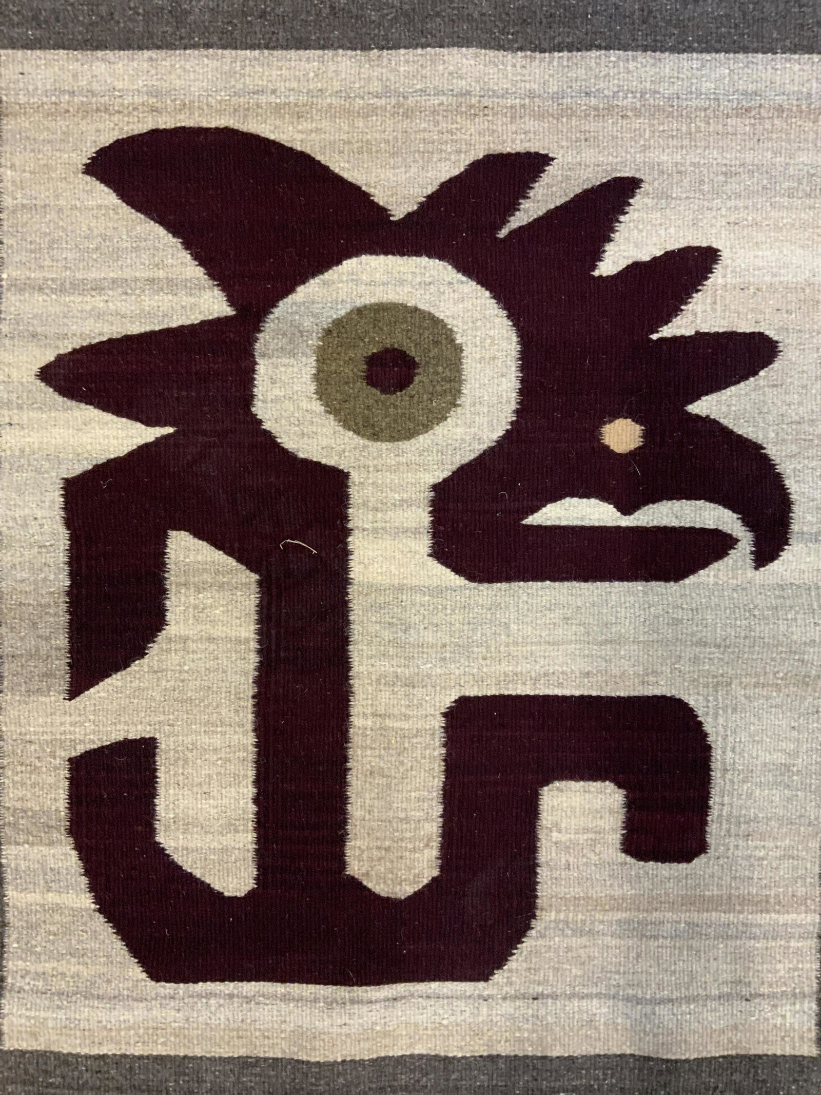 Vintage Fringed Area Rug: Vintage fringed rug, crafted from wool. Appears to be hand woven. Measures approx 55 inches long, 32 inches W. Wear is consistent with age and use. Fringed rug, decorative accessories, decorative arts