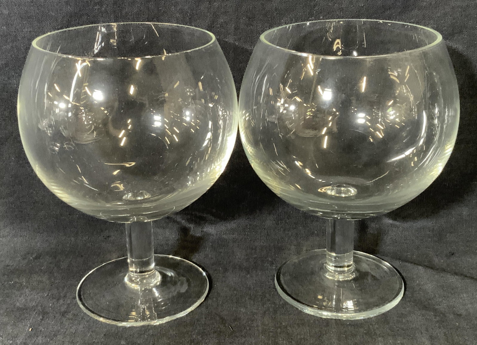 Set 6 Brandy Glasses: Set 6 brandy glasses, no apparent inscriptions or markings to glasses, each measures 5.25 inches tall, each glass is short and stout with small stems and bulbous glass heads, Set, group lot, brandy gl