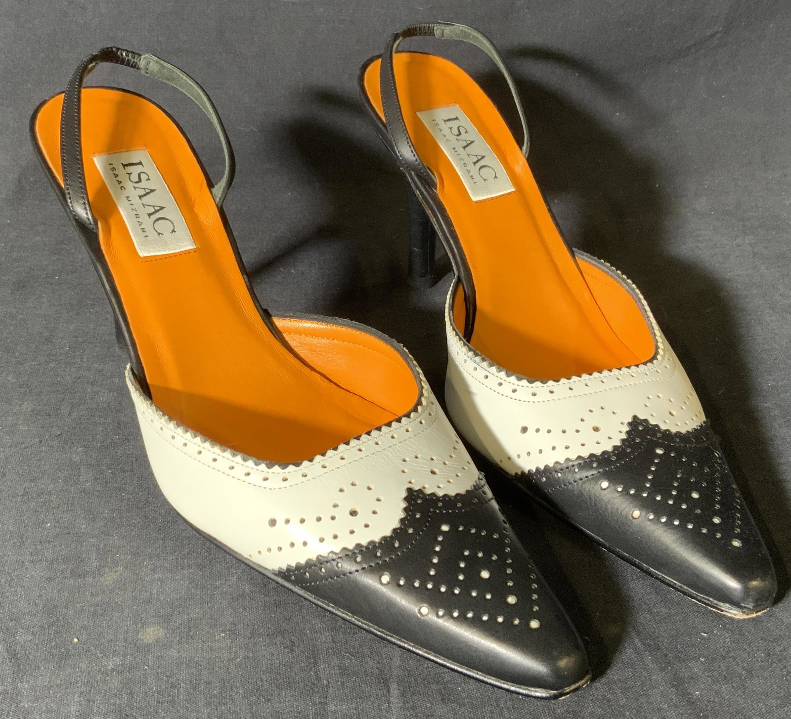 ISAAC MIZRAHI Calfskin Slingback Heels: ISAAC MIZRAHI Calfskin Slingback Heels, comes in original box, inscriptions read ‘Isaac MIZRAHI’, ‘Vero Cuoio Made in Italy 7 1/2 B’, heel measures 3 1/4 inches tall, wear evident with use, Is