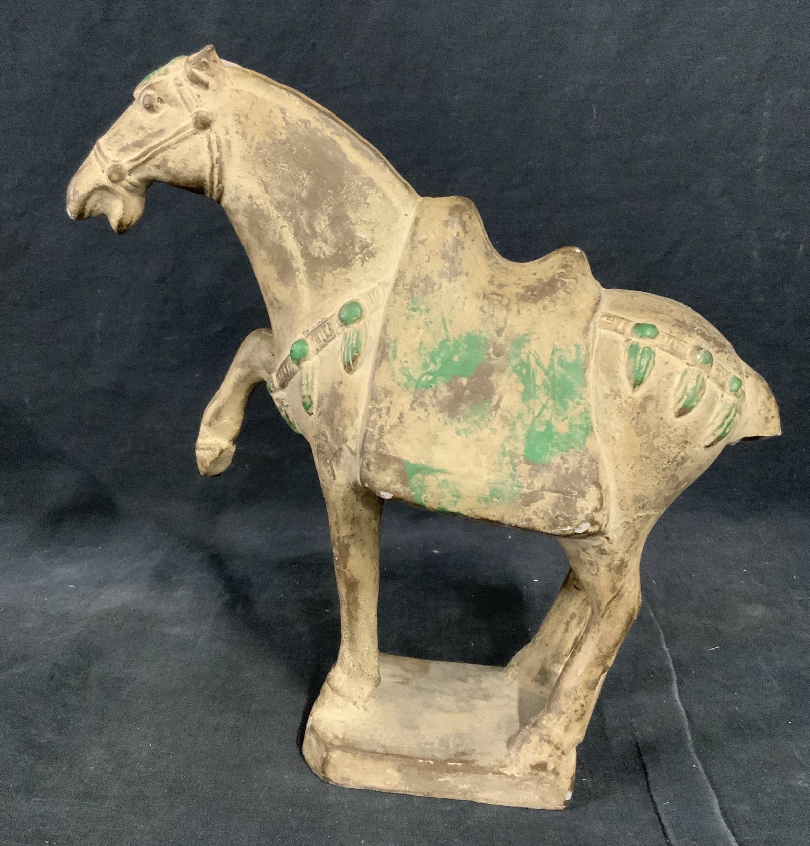 Ceramic Horse Sculpture: Ceramic Horse sculpture, no apparent inscriptions or markings, subject a horse with front hoof raised, breaks to tail and mouth, evidence of past paint to surface, measures 10.5 inches at tallest poin